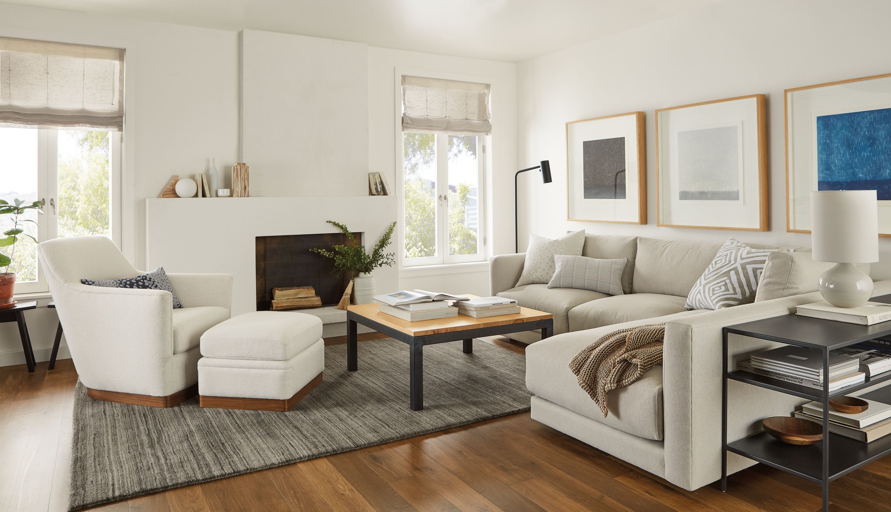 Detail of Clemens sofa with chaise in flint fabric in living room.