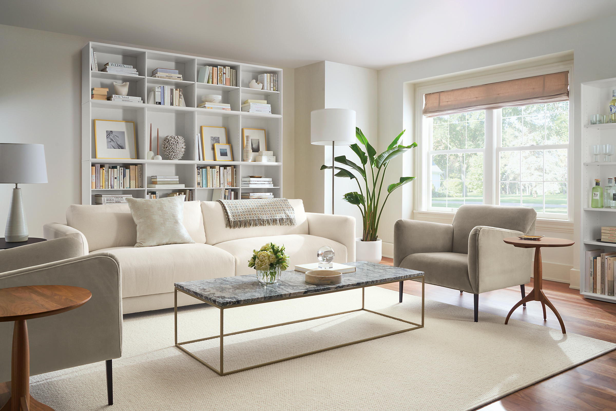 living room with clemens sofa, matteo chairs, tyne coffee table.