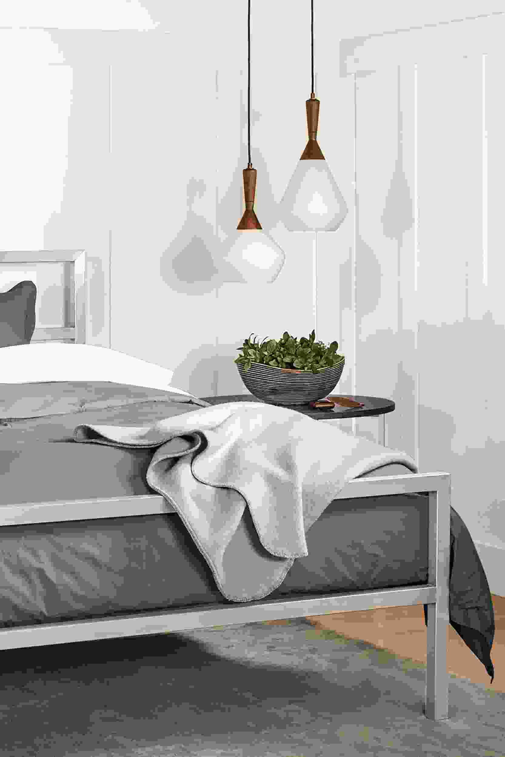 Detail of Parsons stainless steel queen bed in all stainless steel.