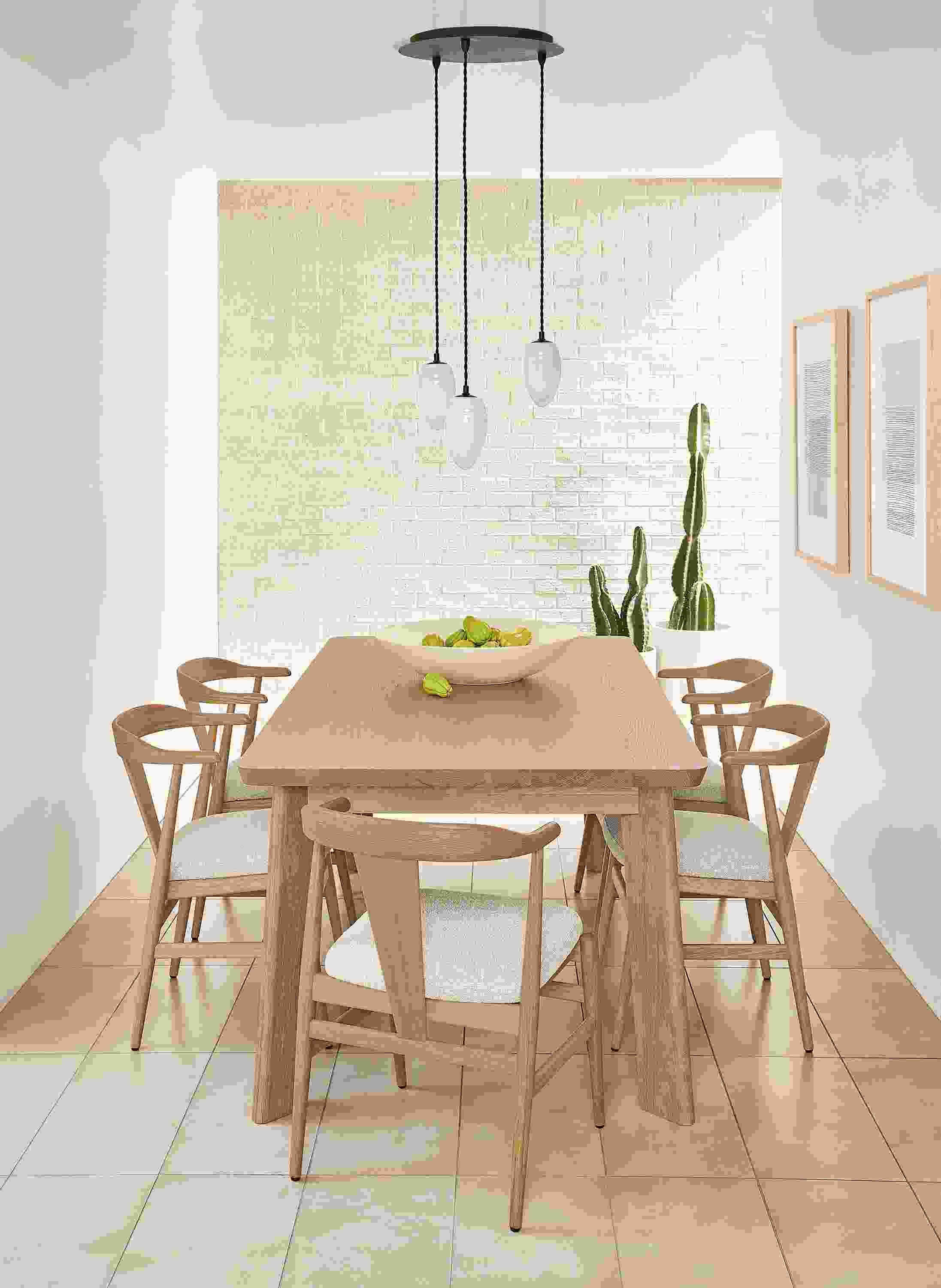 Minimalist dining room with Colby table, Evan chairs and Polar pendants.