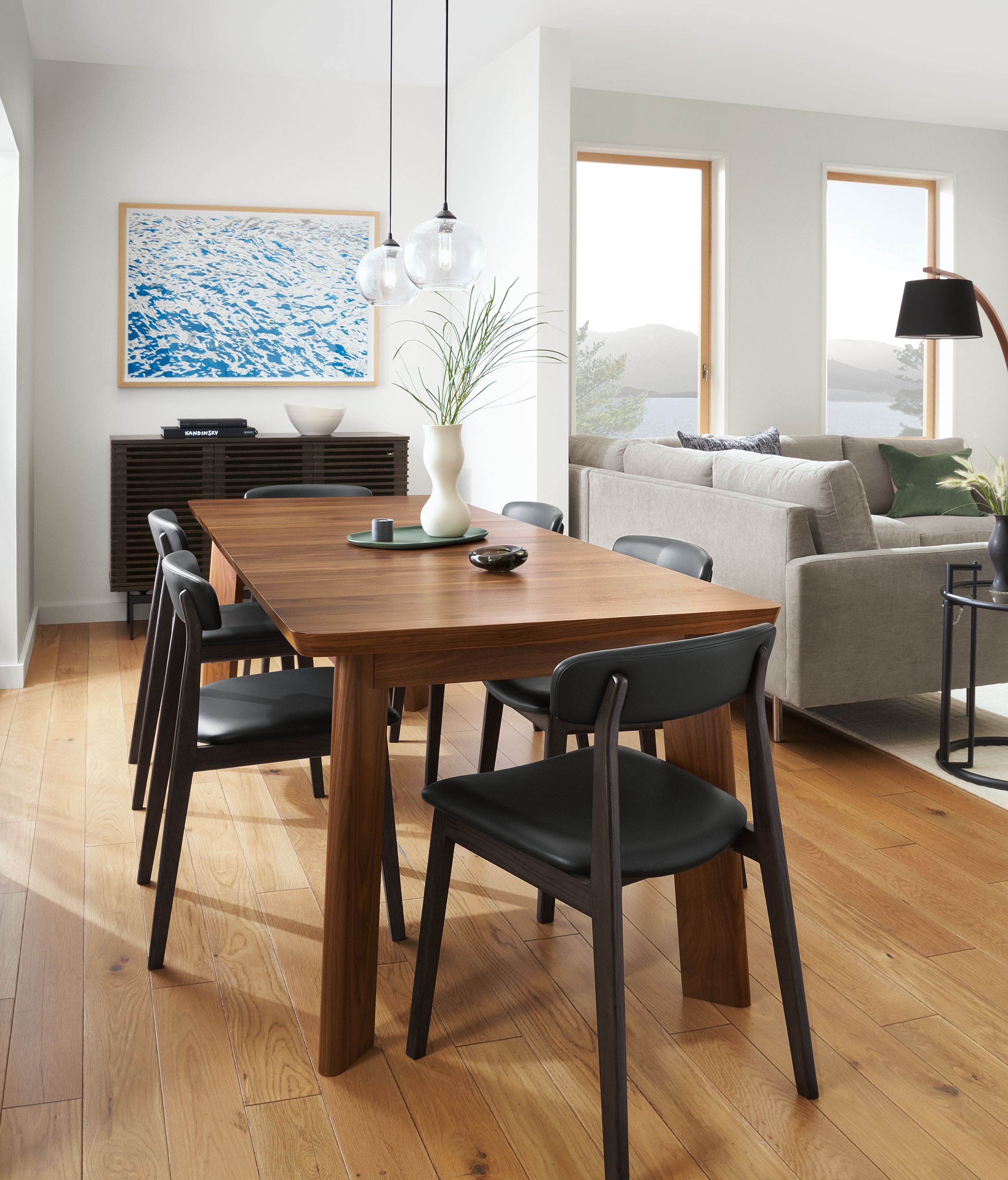 Dining room with colby extension table in walnut, errol chairs in black and coles cabinet in charcoal.