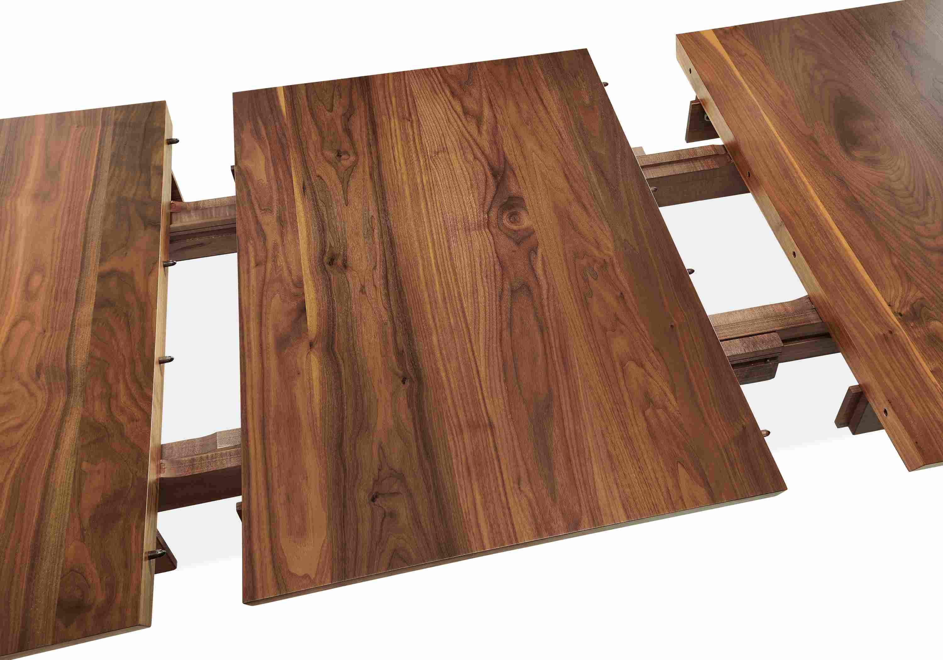 detail of walnut colby extension table leaf in center