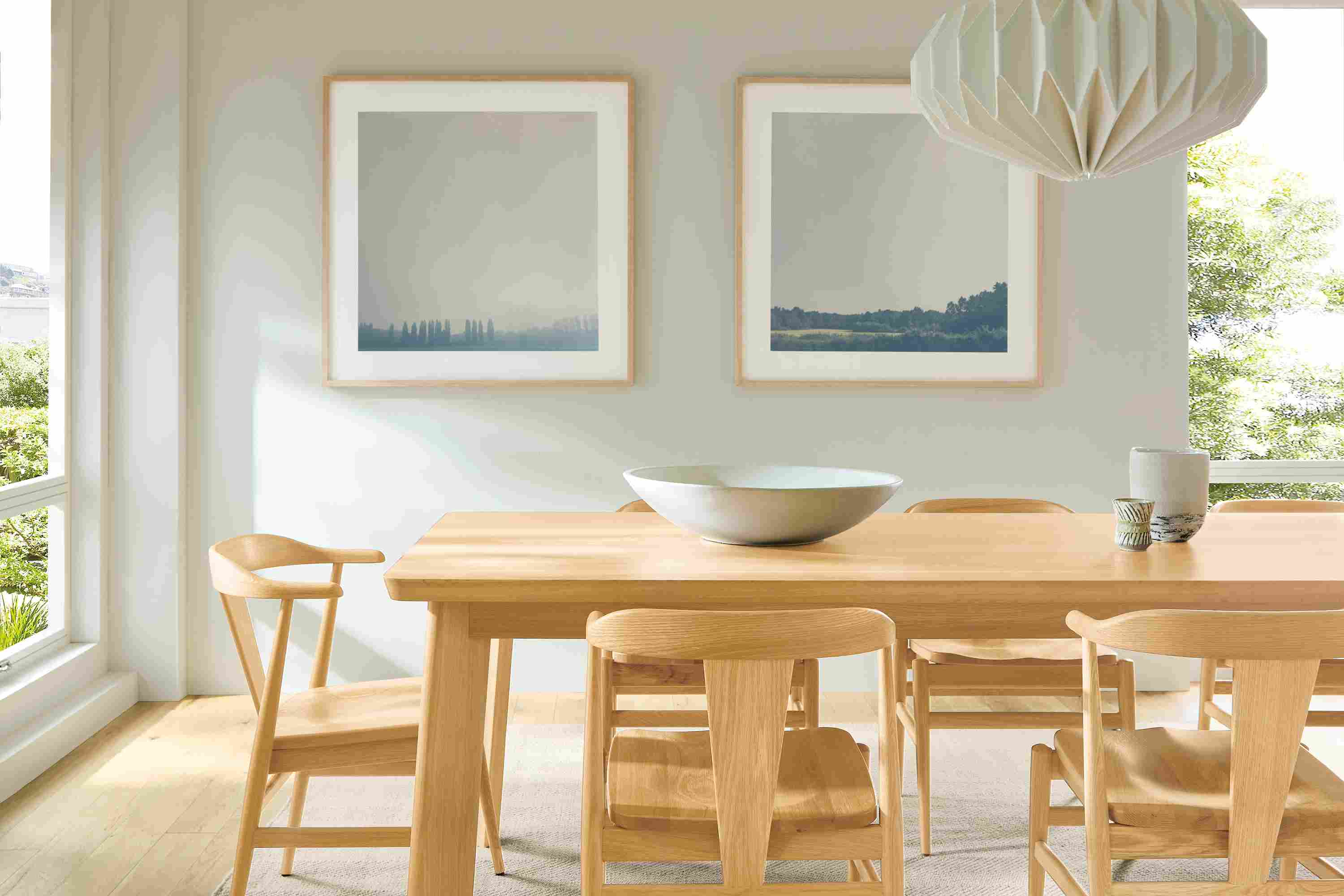 Dining room with detail of colby table and 6 evan arm chairs with wood seat all in white oak.
