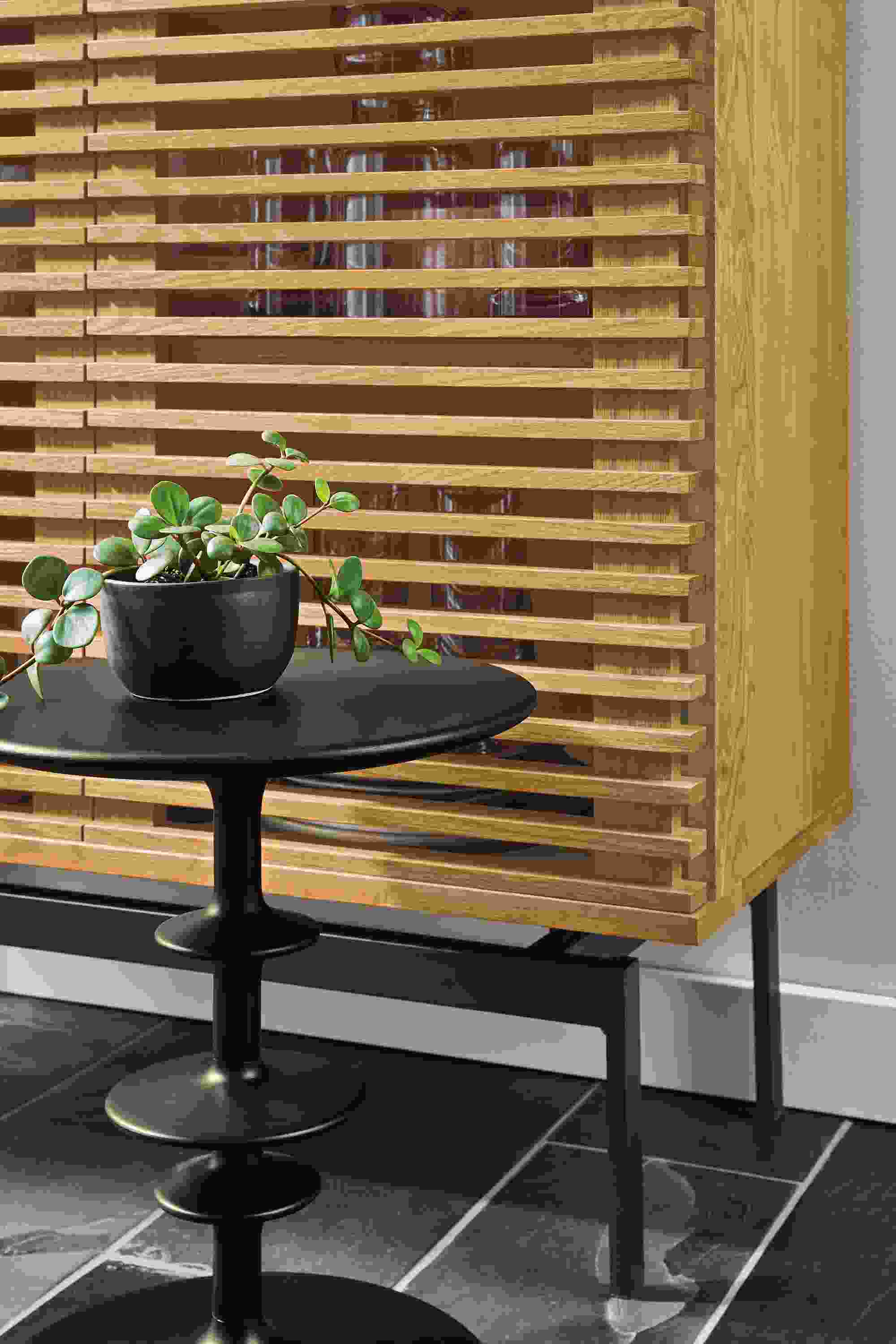 Detail of door slats of Coles two-door storage cabinet in white oak.