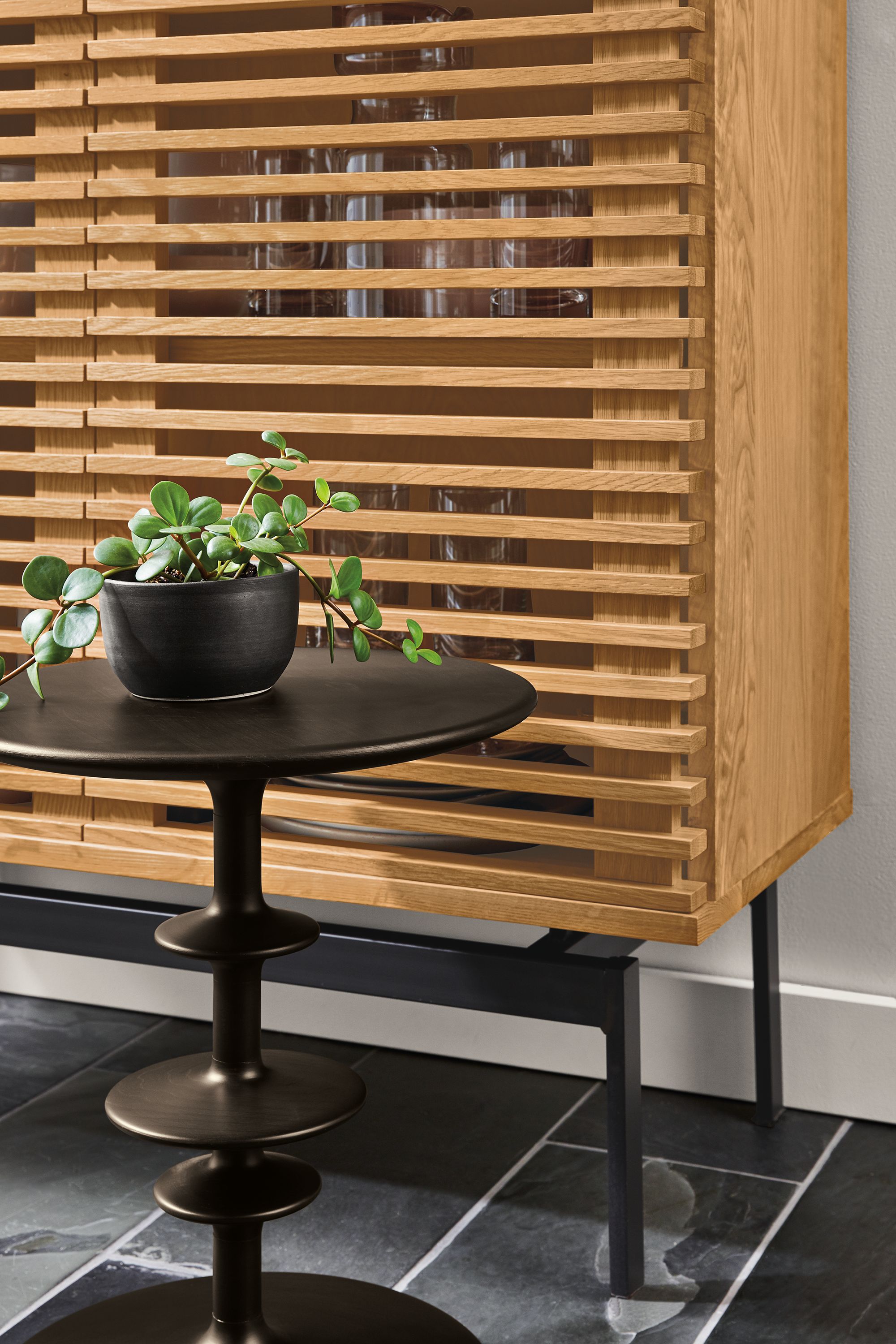 Detail of door slats of Coles two-door storage cabinet in white oak.