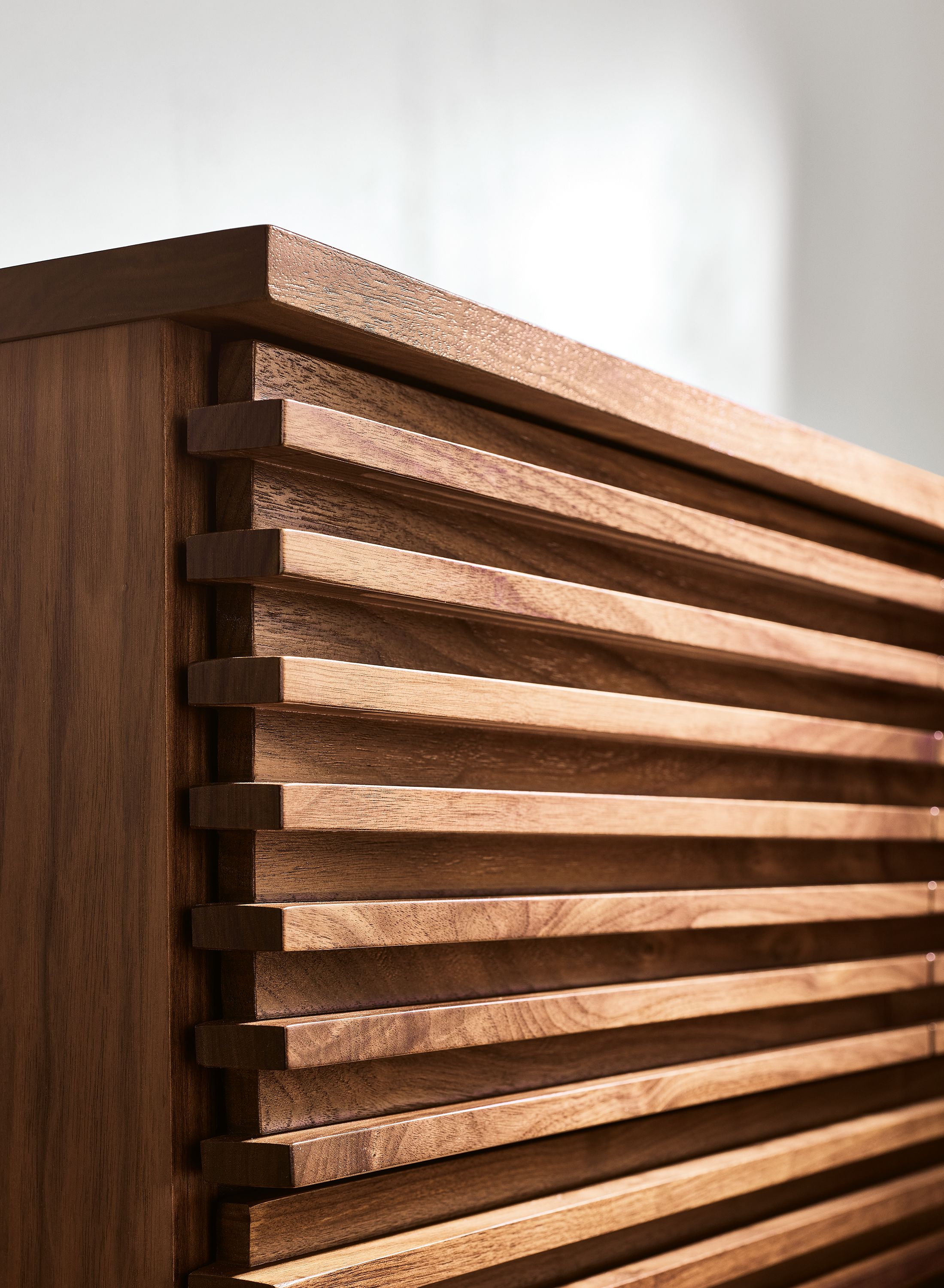 Close up of drawers on Coles 72-wide ten-drawer dresser in walnut.
