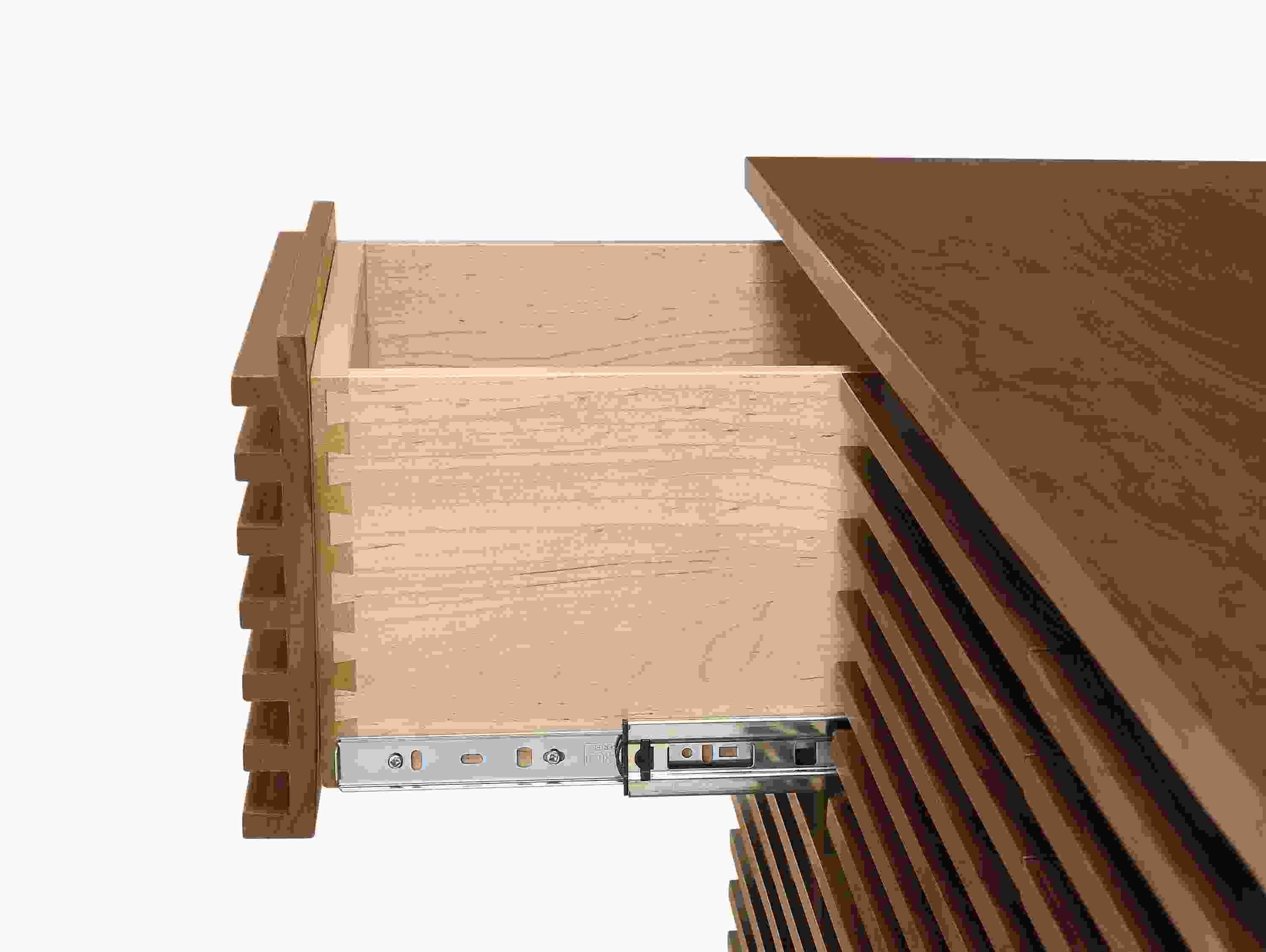 Close-up of of drawer slider on Coles 72-wide ten-drawer dresser in walnut.