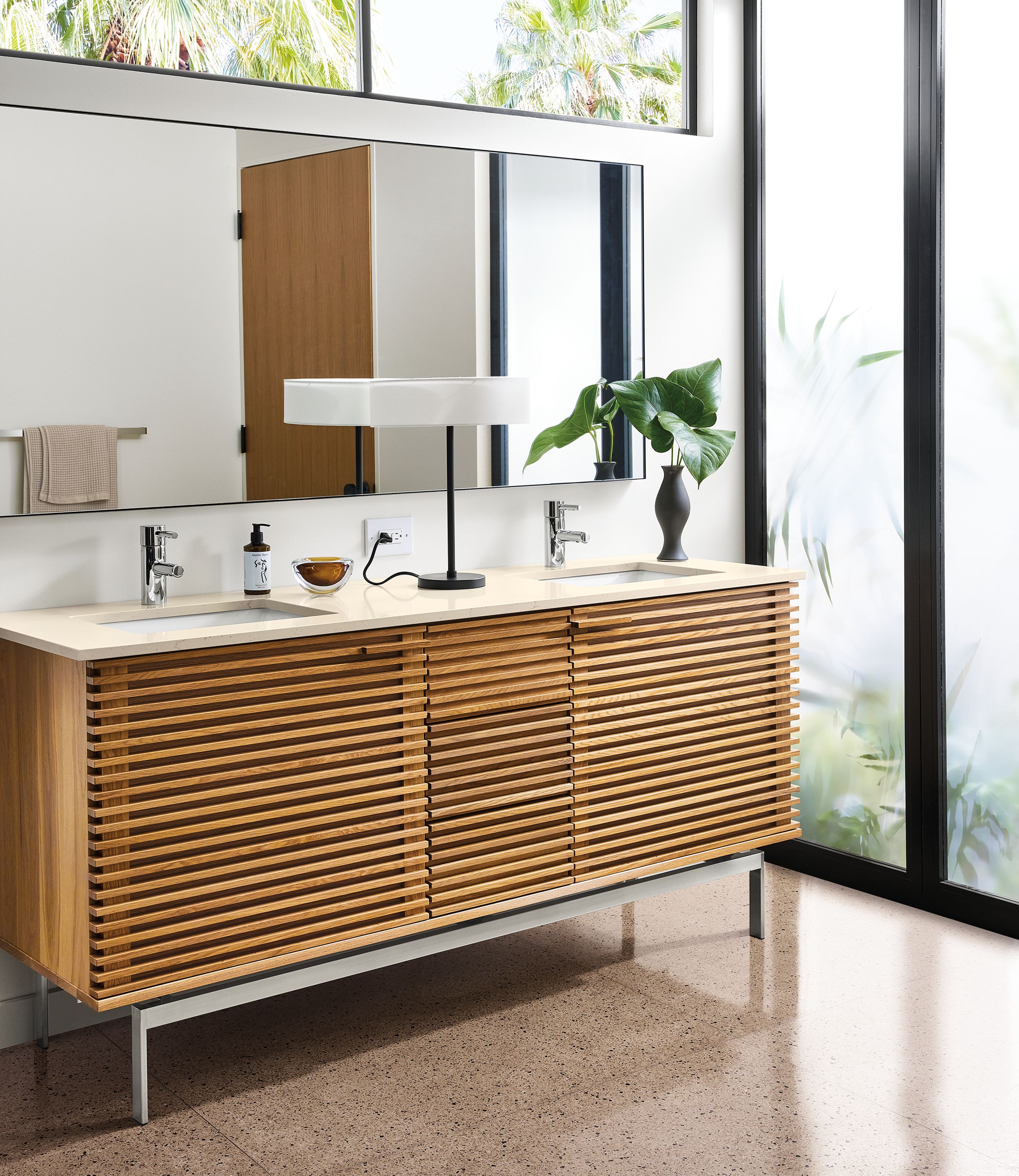 bathroom with 72-wide coles vanity in white oak, infinity wall mirror, cohen table lamp.