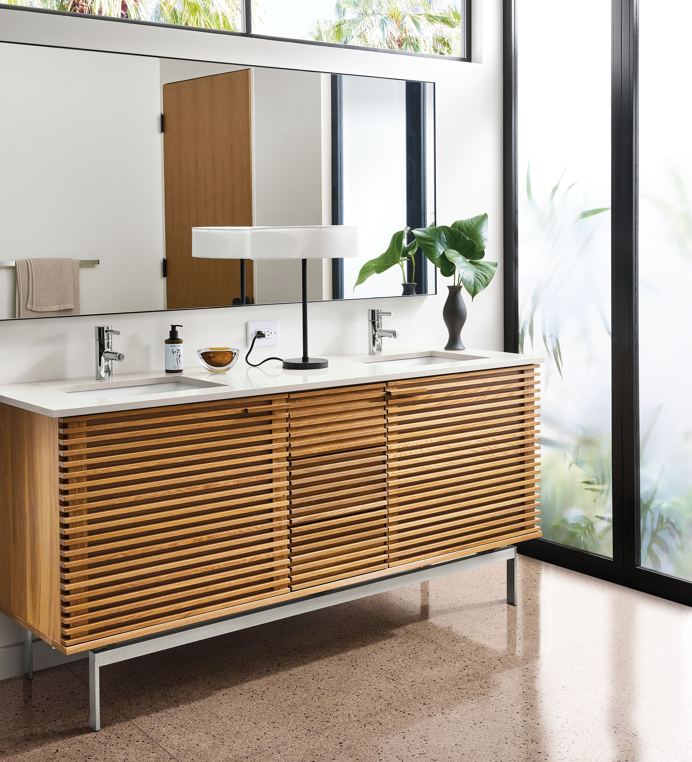 Bathroom with 72-wide coles vanity in white oak, infinity wall mirror, cohen table lamp.