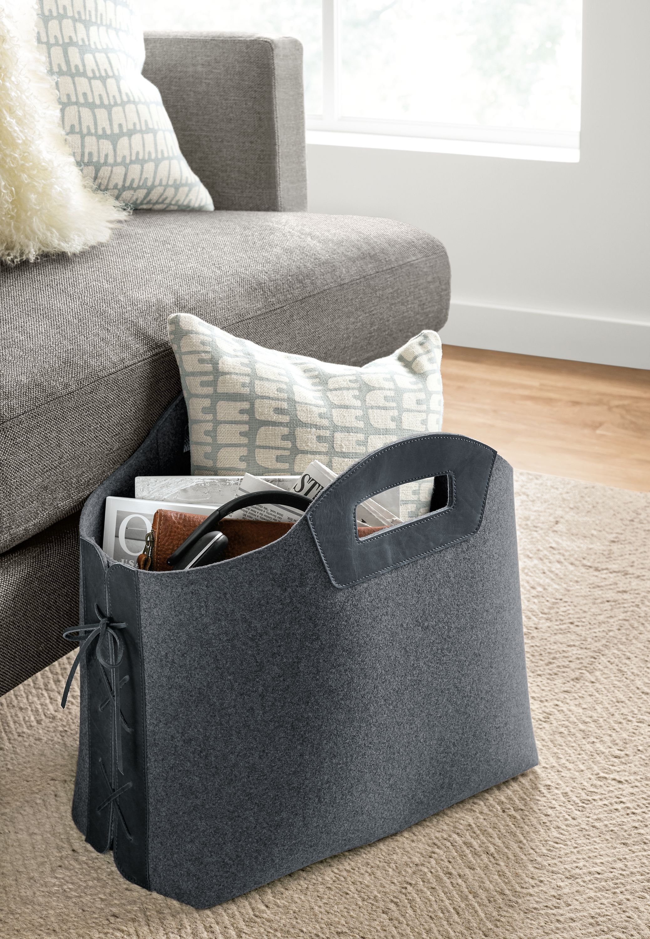 Detail view of Collette large felt storage basket.