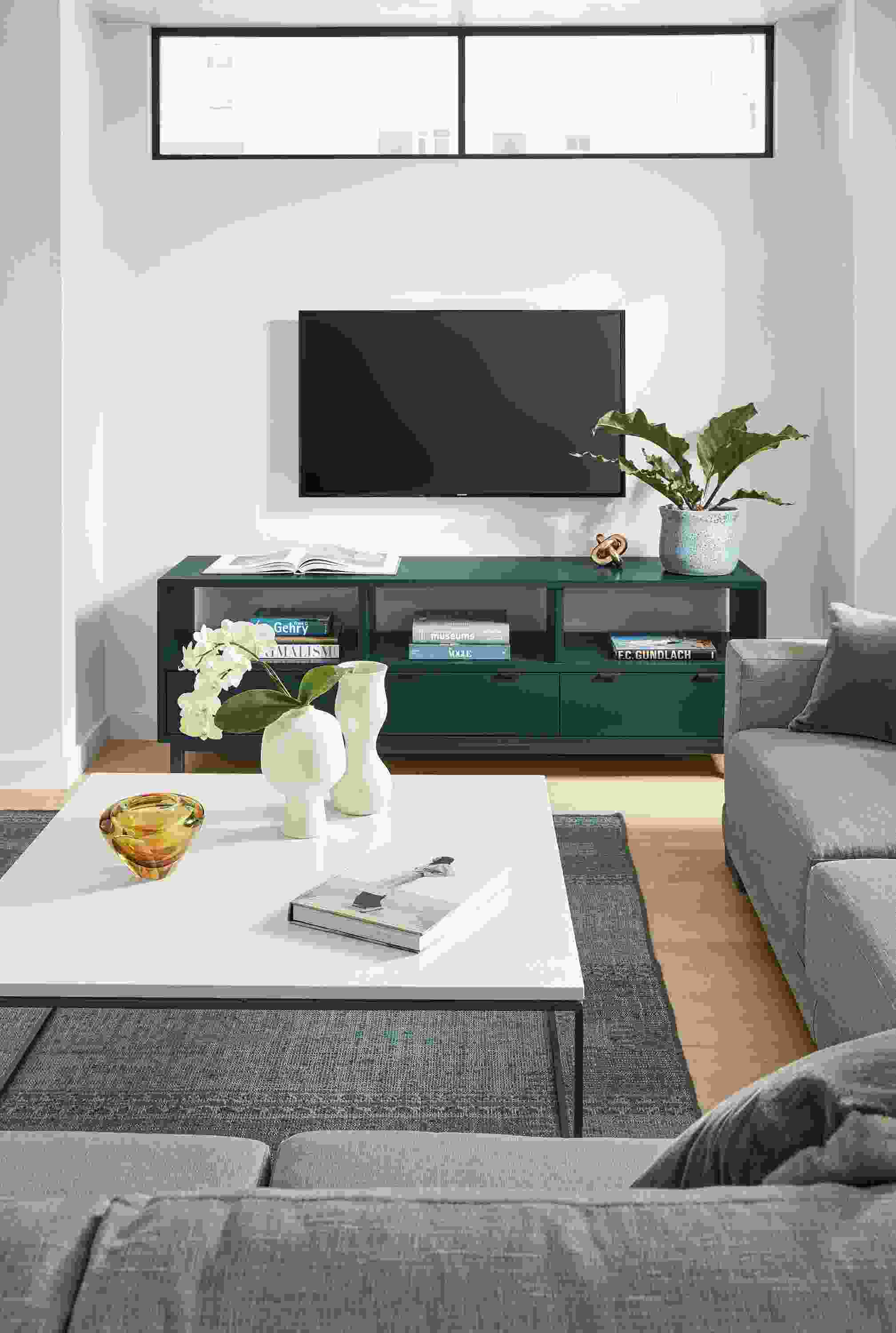 Detail of Copenhagen 3-drawer media cabinet in Slate in living room.
