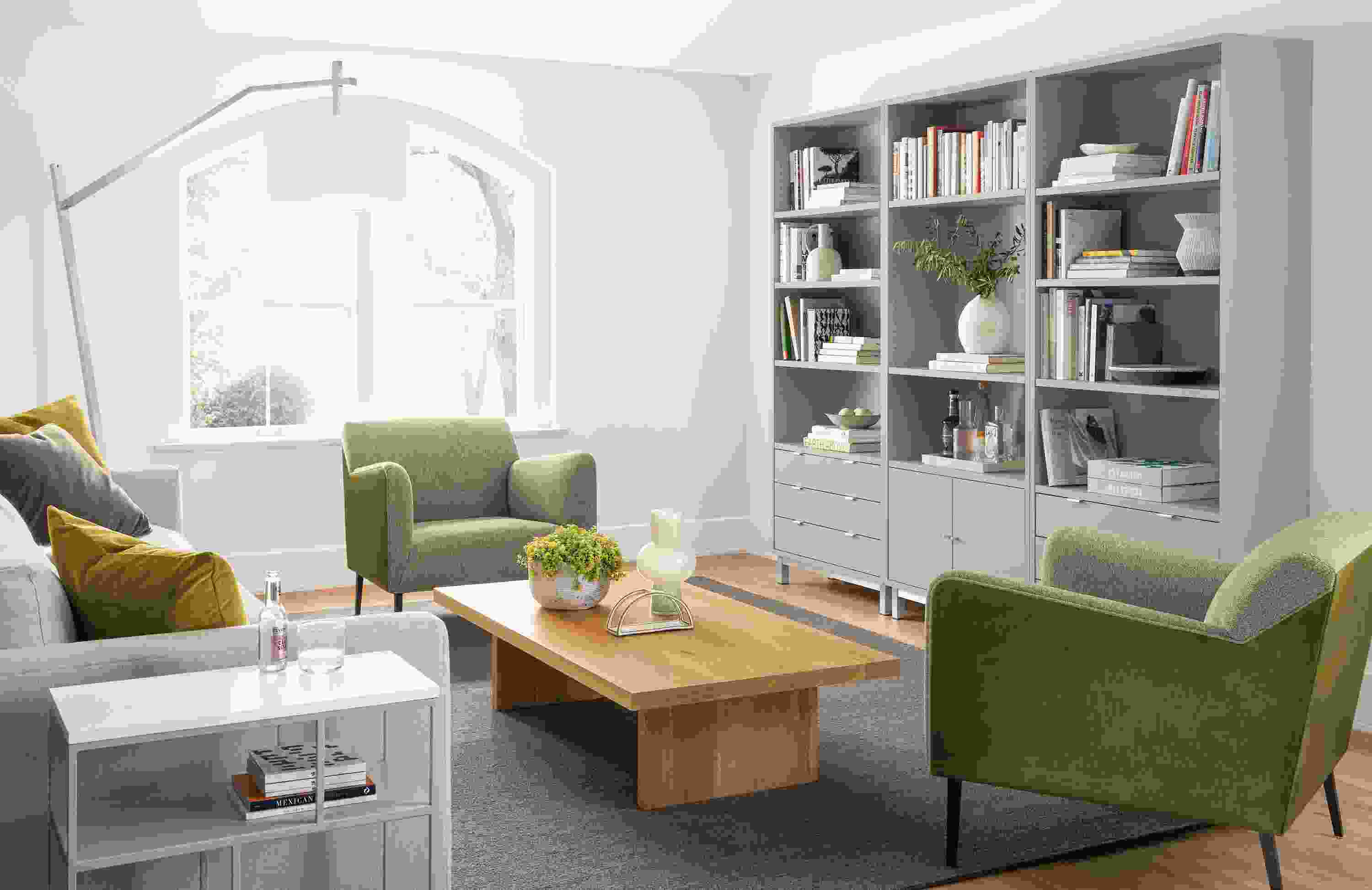 Detail of Copenhagen bookcases with drawers and doors in Taupe in living room.