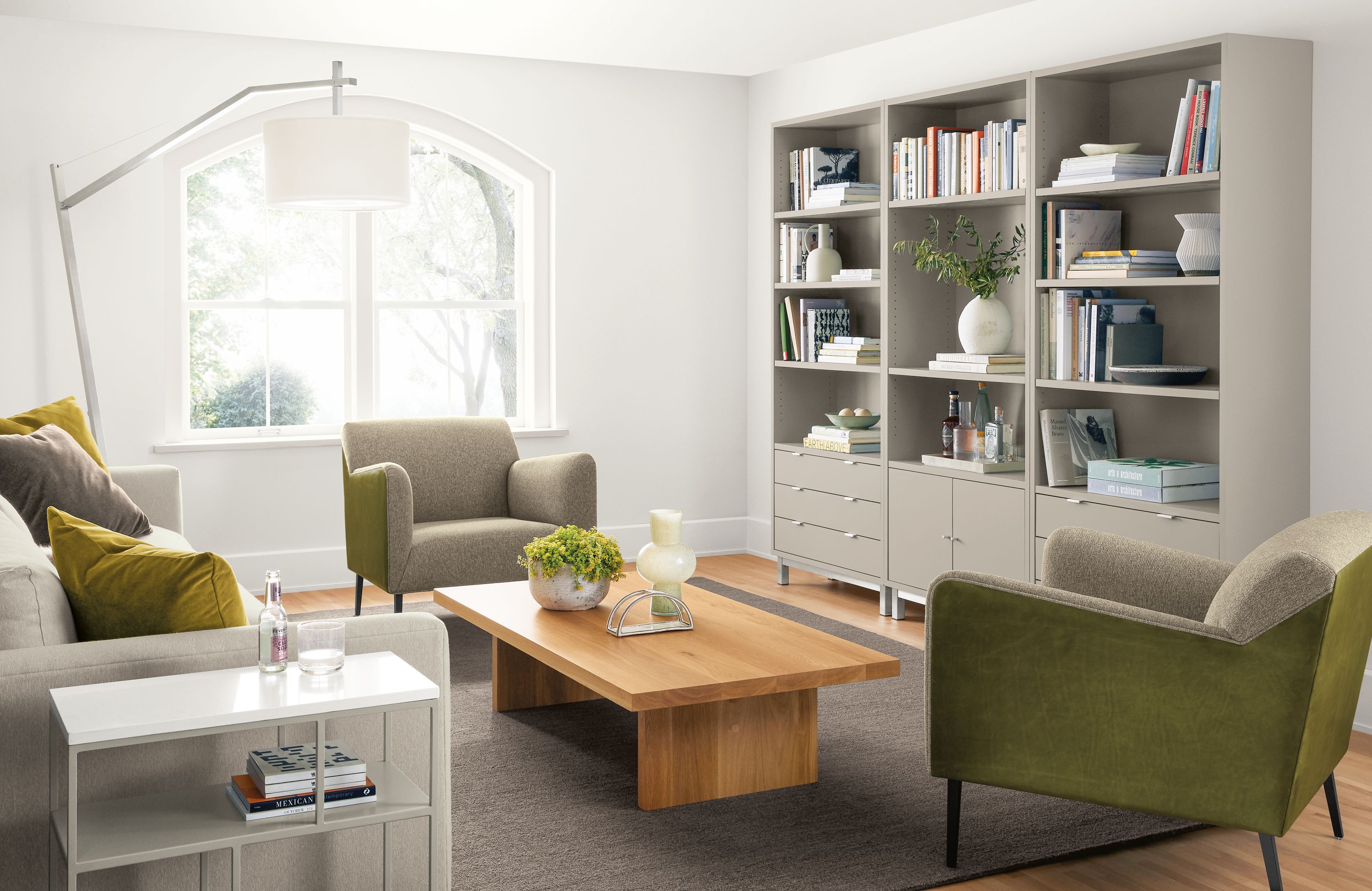 Detail of Copenhagen bookcases with drawers and doors in Taupe in living room.