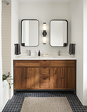 bathroom with Copenhagen 60-wide vanity in walnut with white quartz top and black steel base.