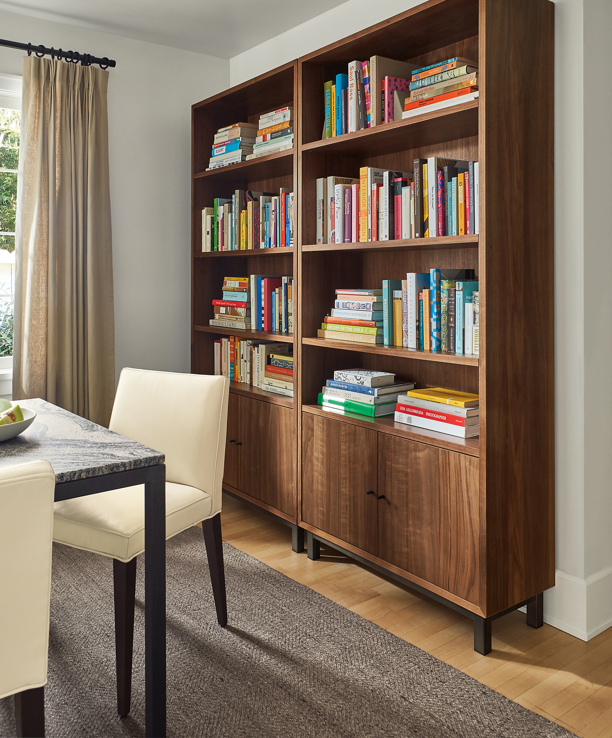 Living room with two Copenhagen 36-wide bookcases in walnut.