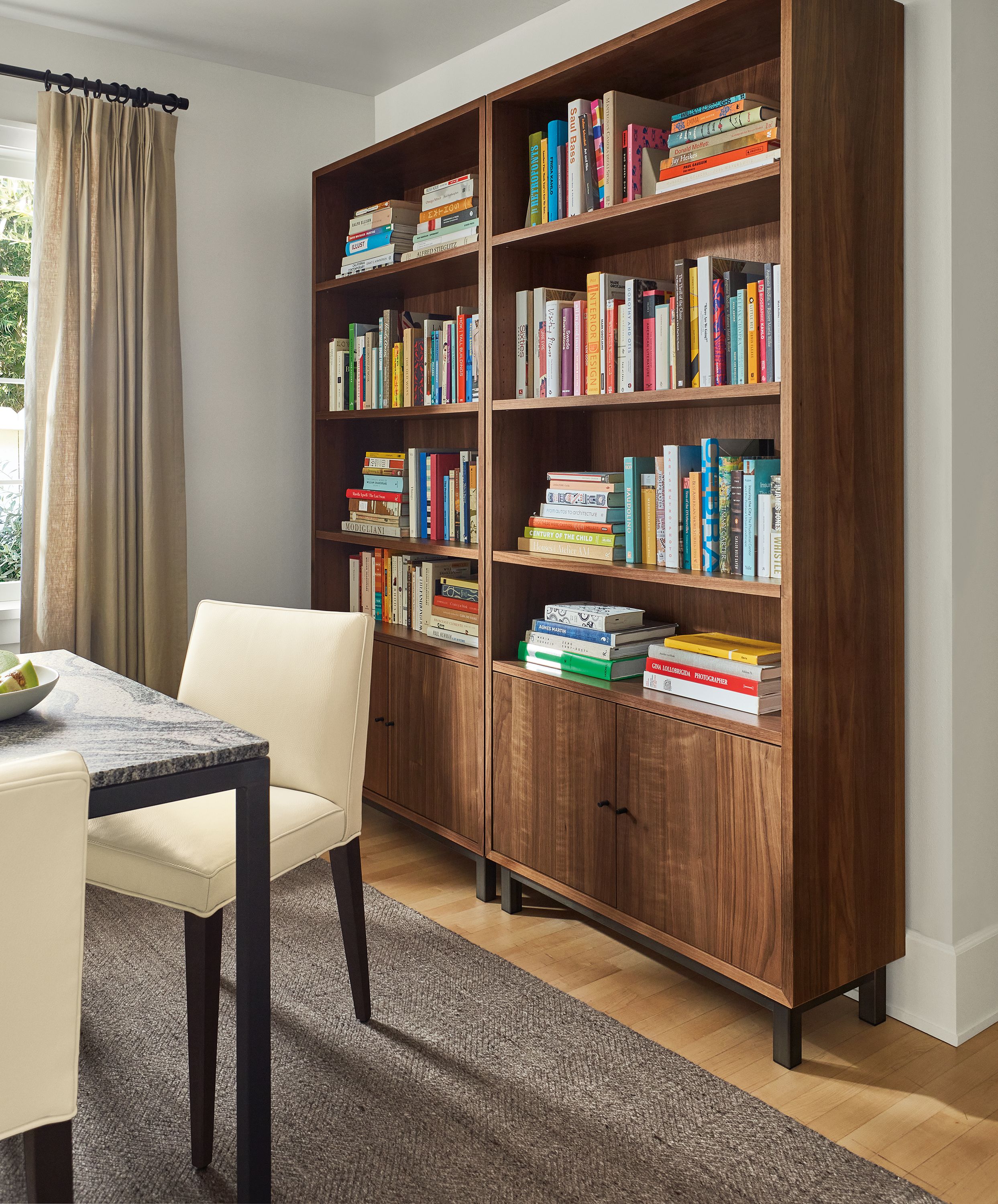 Living room with two Copenhagen 36-wide bookcases in walnut.