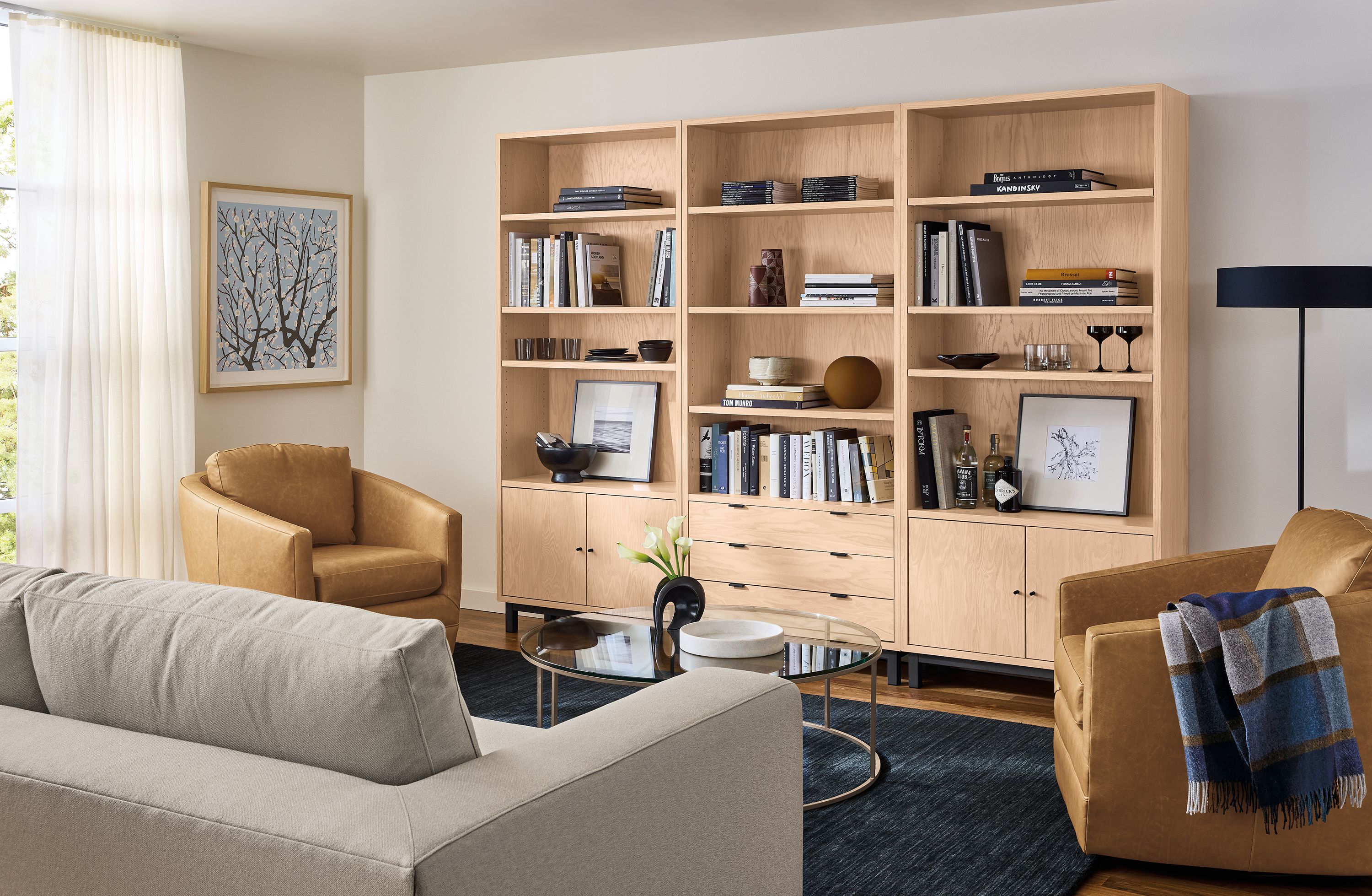 36w two-door and three-drawer bookcases in oak with salt stain