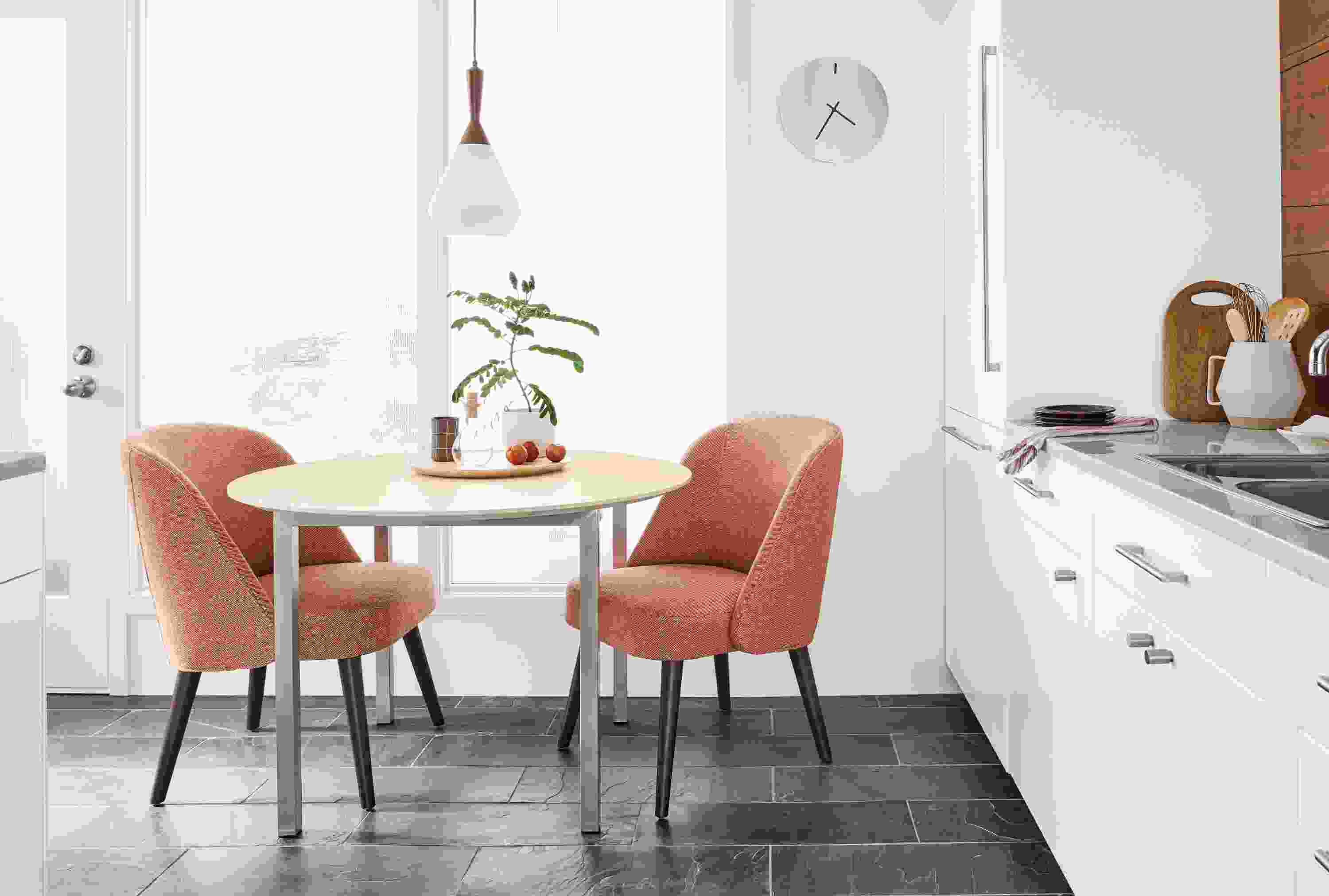 Detail of Cora side chairs in small kitchen.