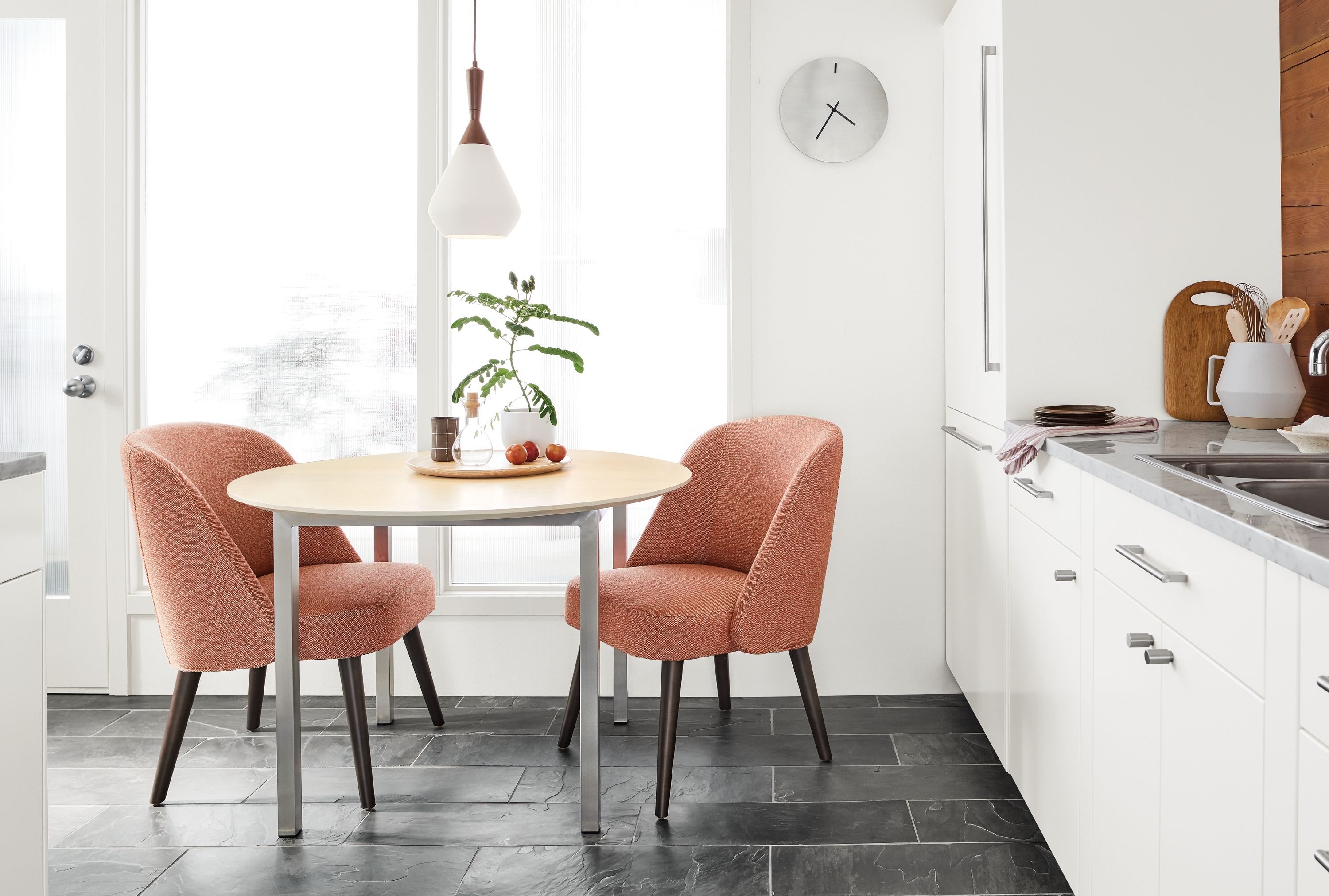 Detail of Cora side chairs in small kitchen.