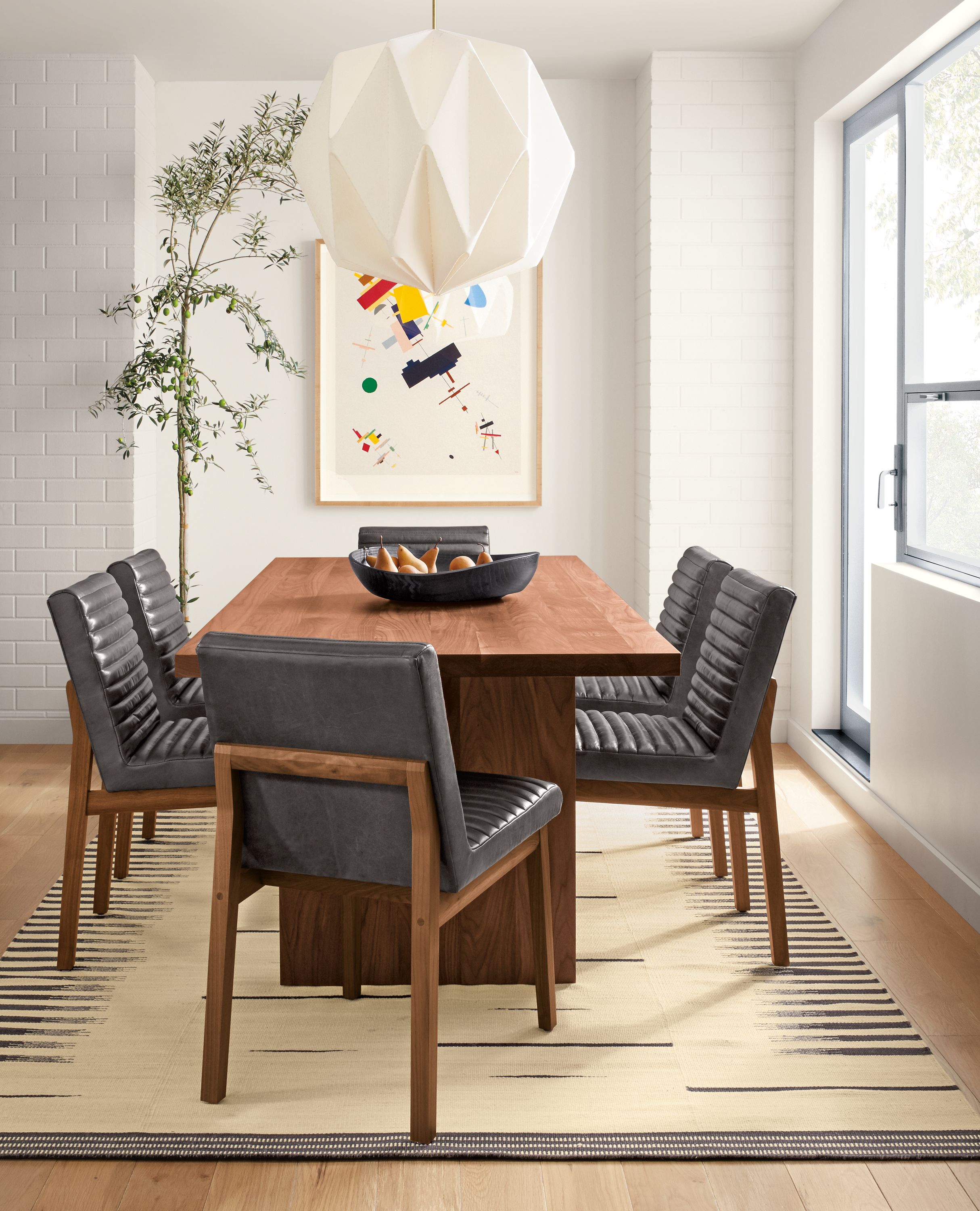 Corbett walnut table with Olsen chairs.