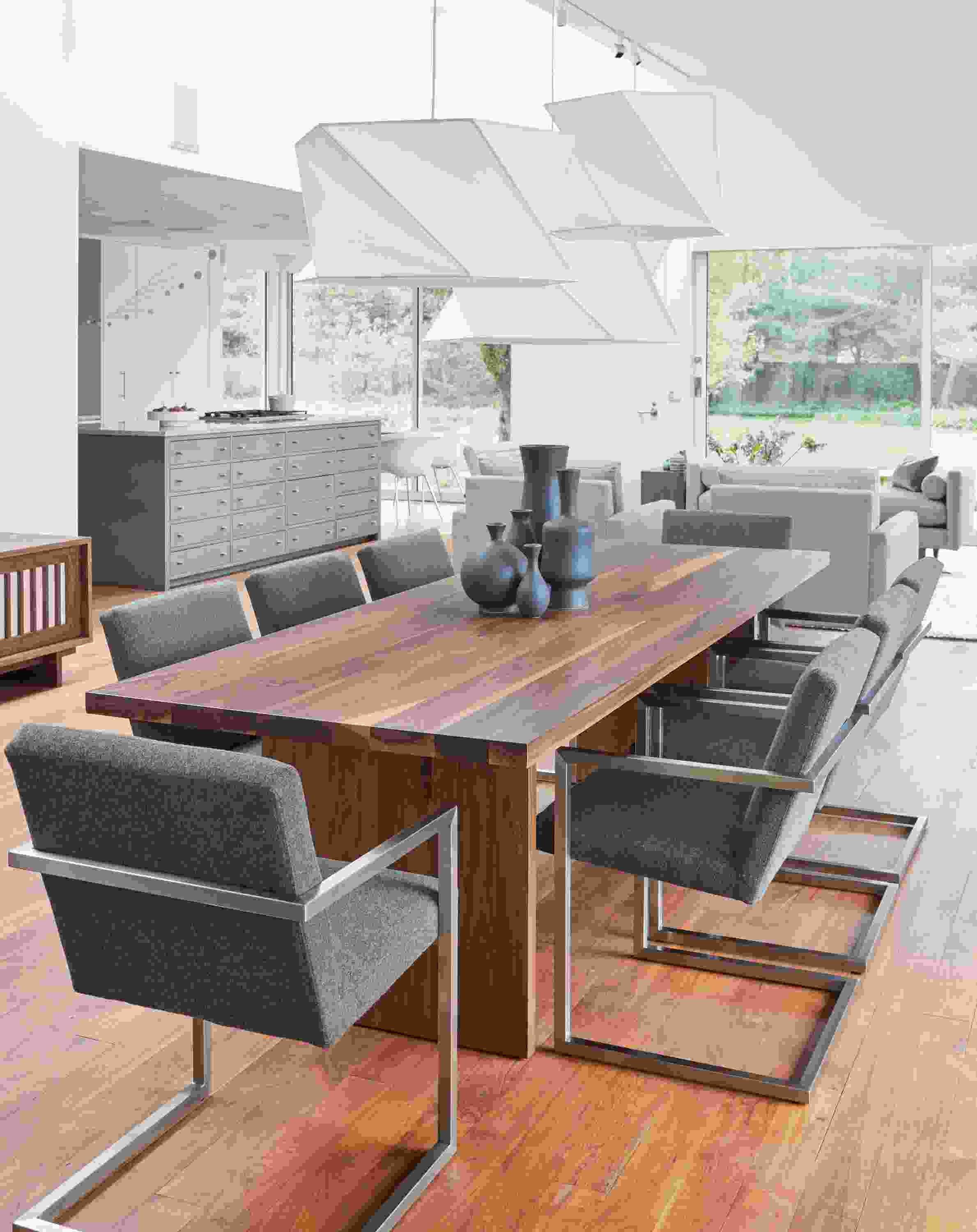 Side detail of Corbett table and Lira chairs.