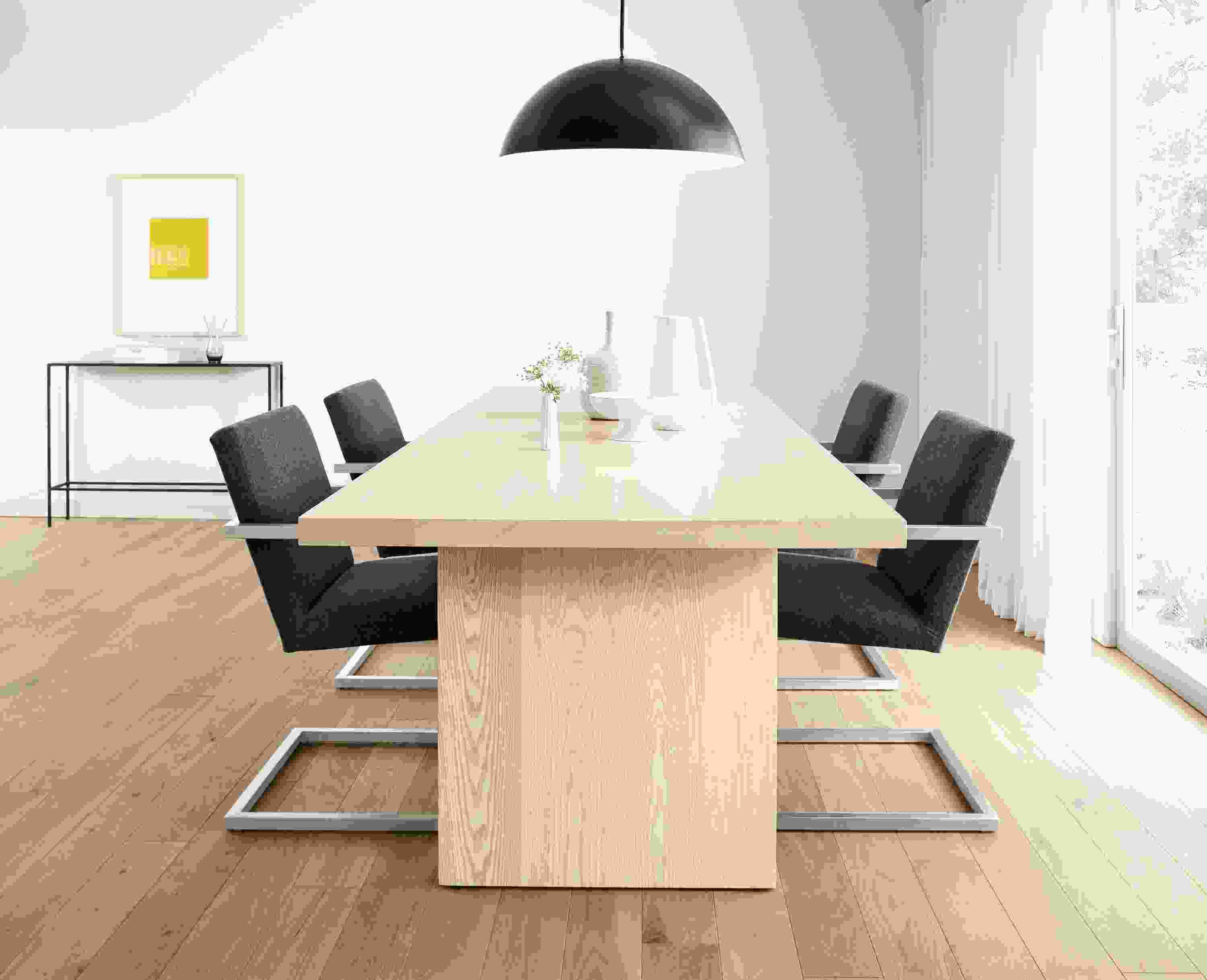 Detail of Corbett dining table in sand.