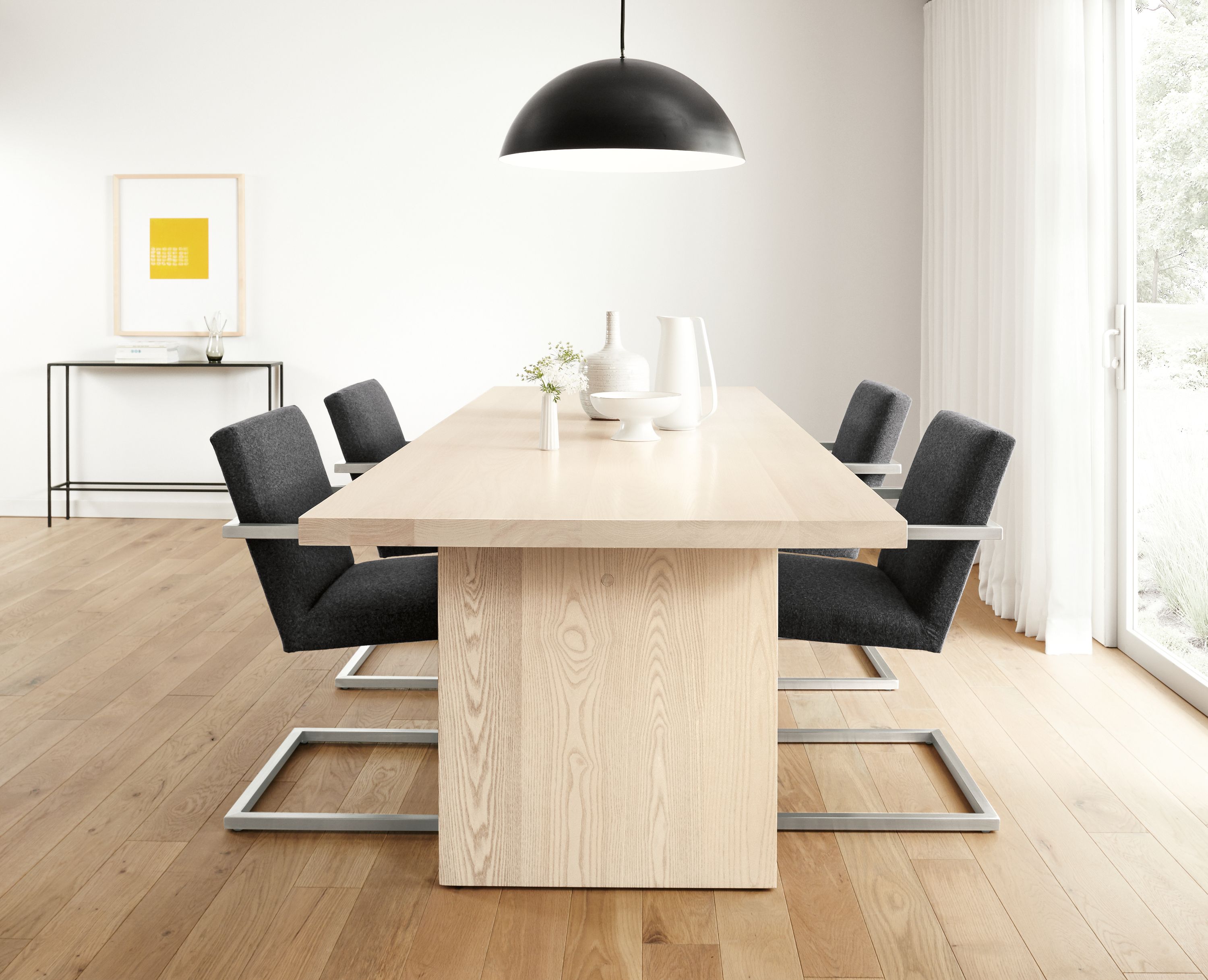 Detail of Corbett dining table in sand.