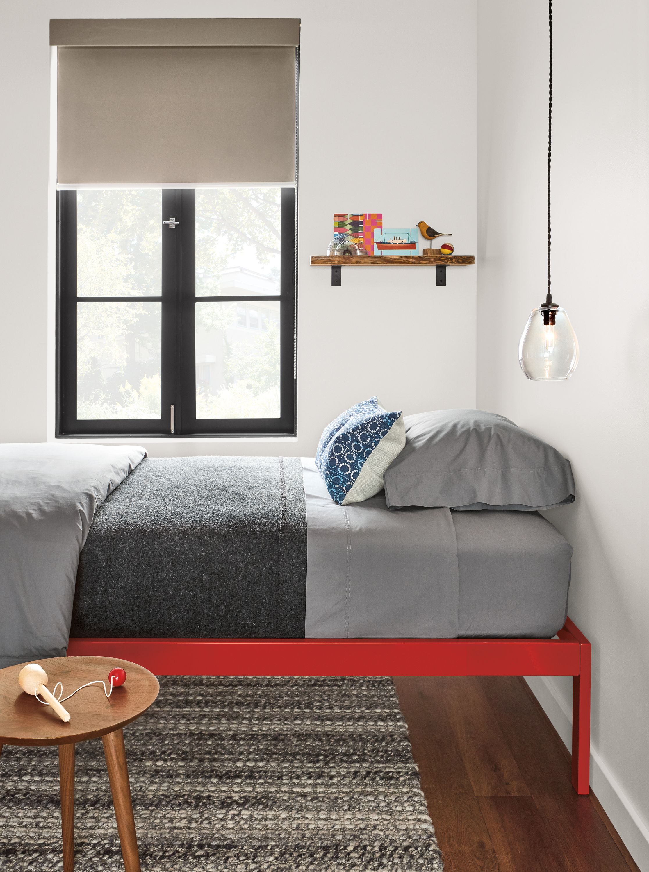 Detail of Core twin bed in red.