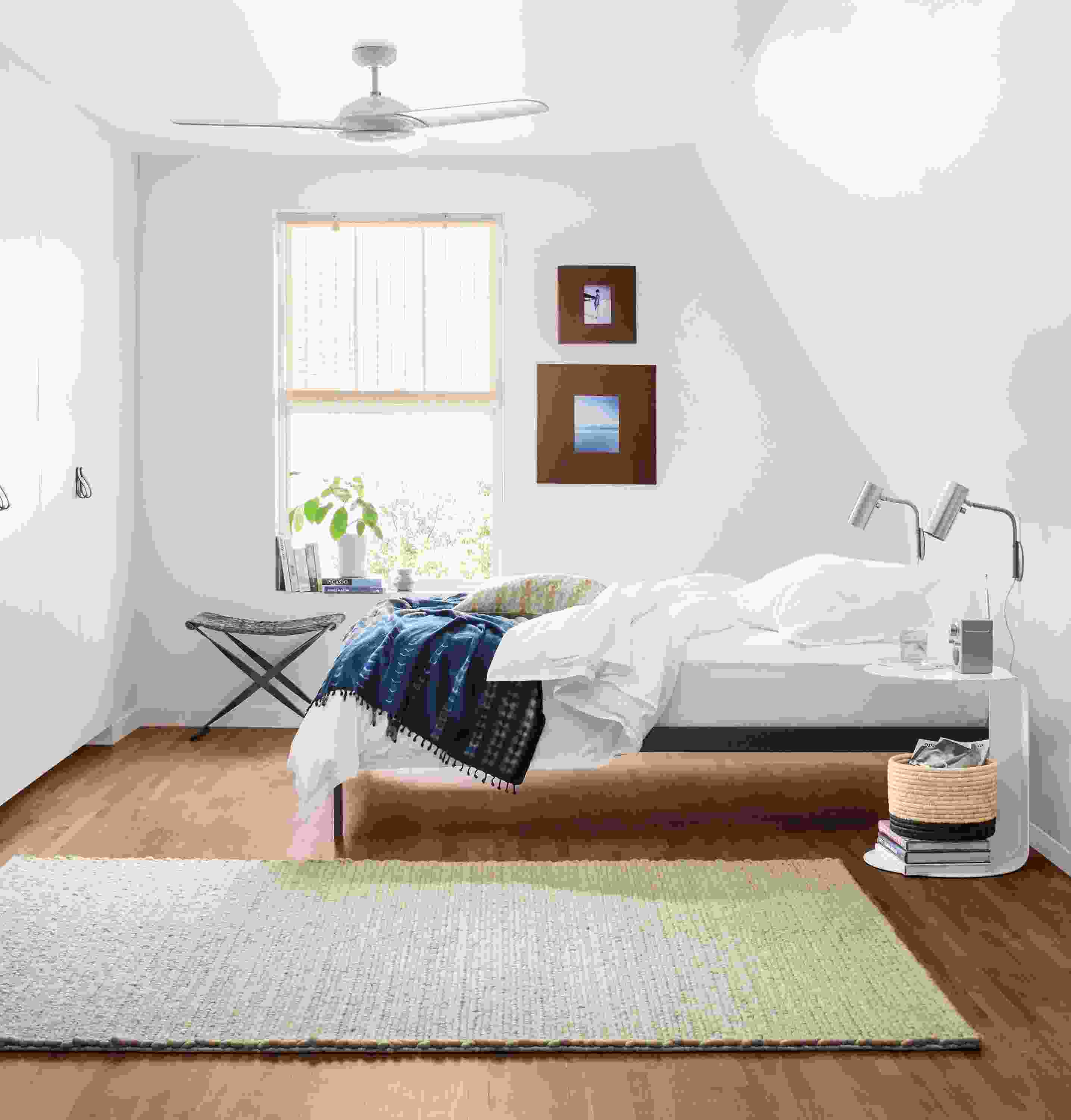 Detail of Core platform bed in small minimal bedroom.