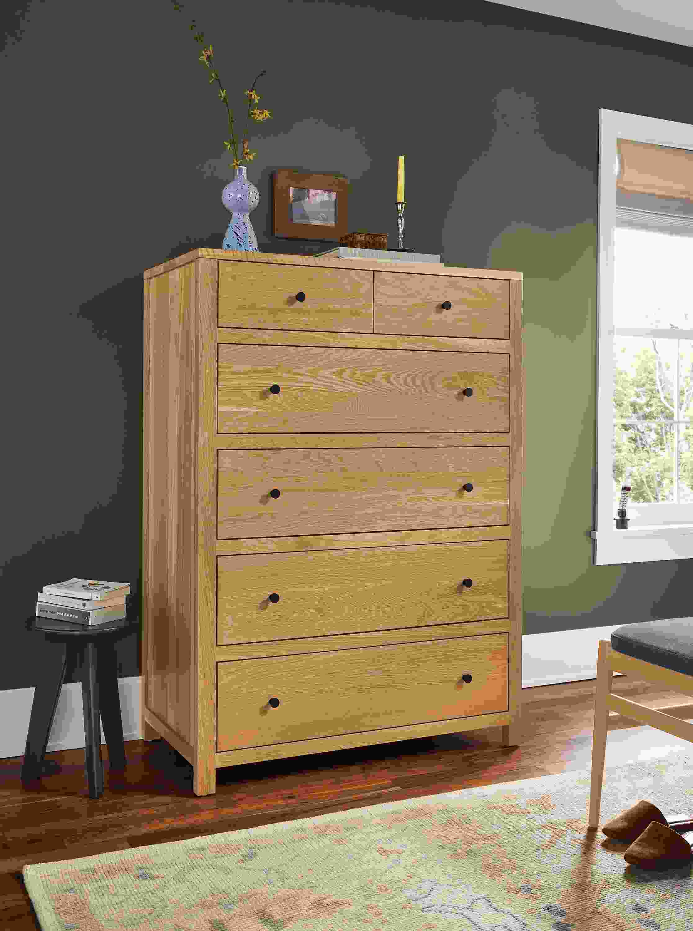 Bedroom with Corwin 40-wide six-drawer dresser in white oak, Hollins wood stool and Ophelia rug in pumice.