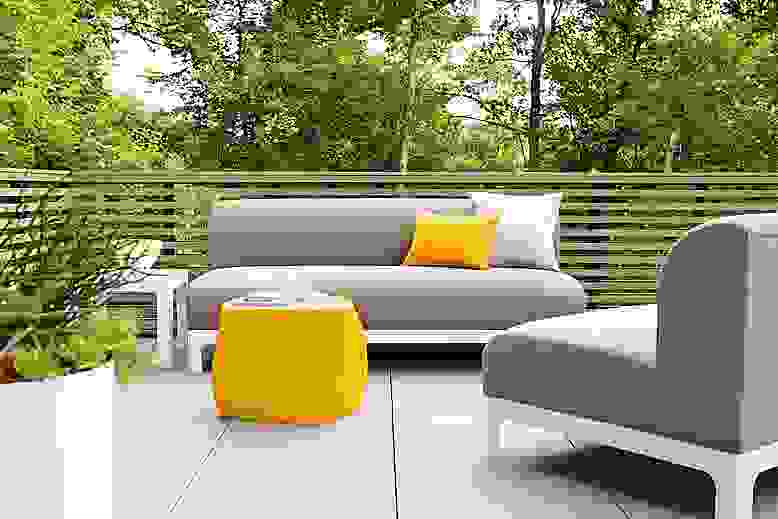 Detail of Crescent outdoor sofa and armless chair.