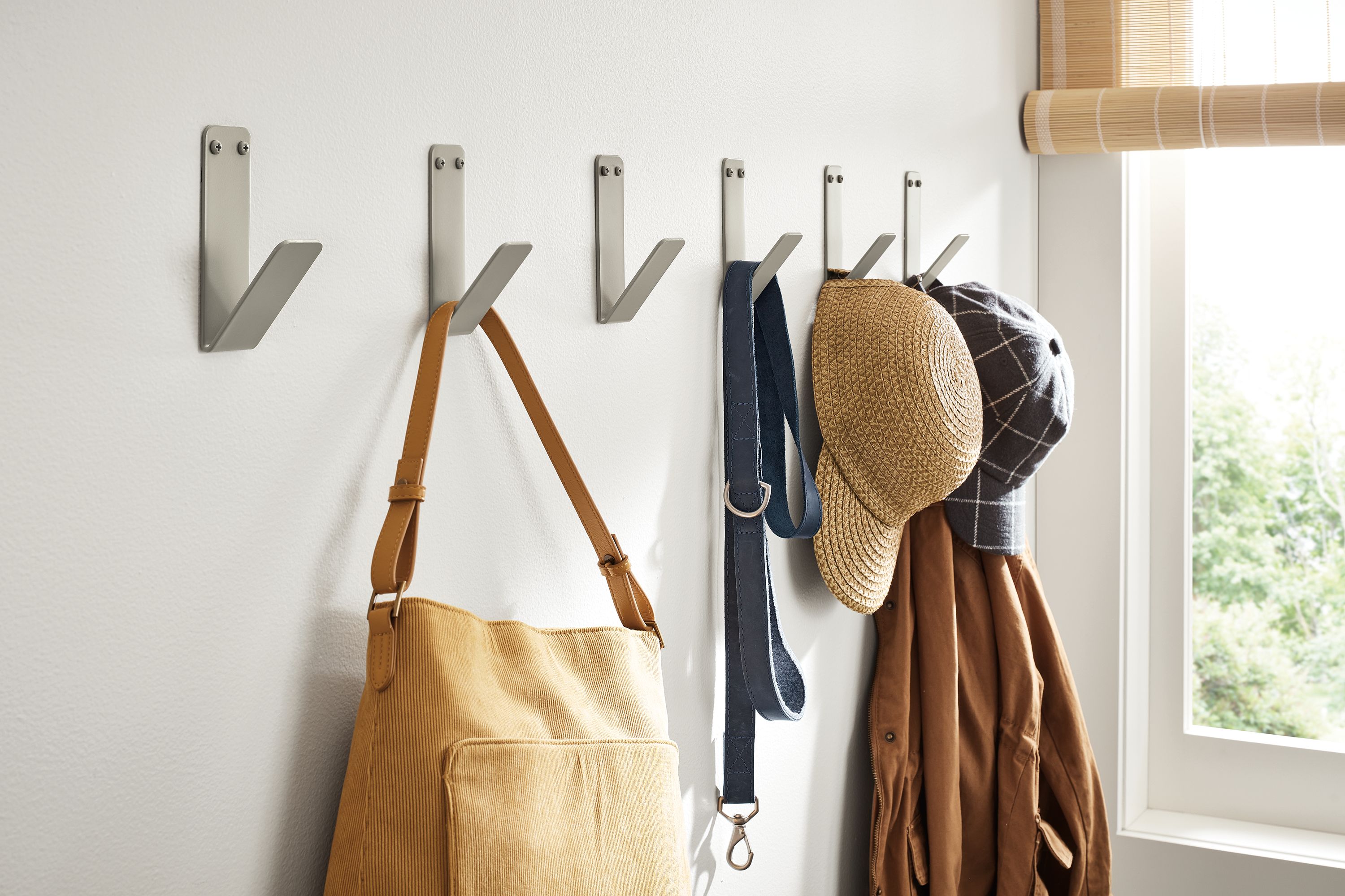 entryway with six crew wall hooks in taupe powdercoat.