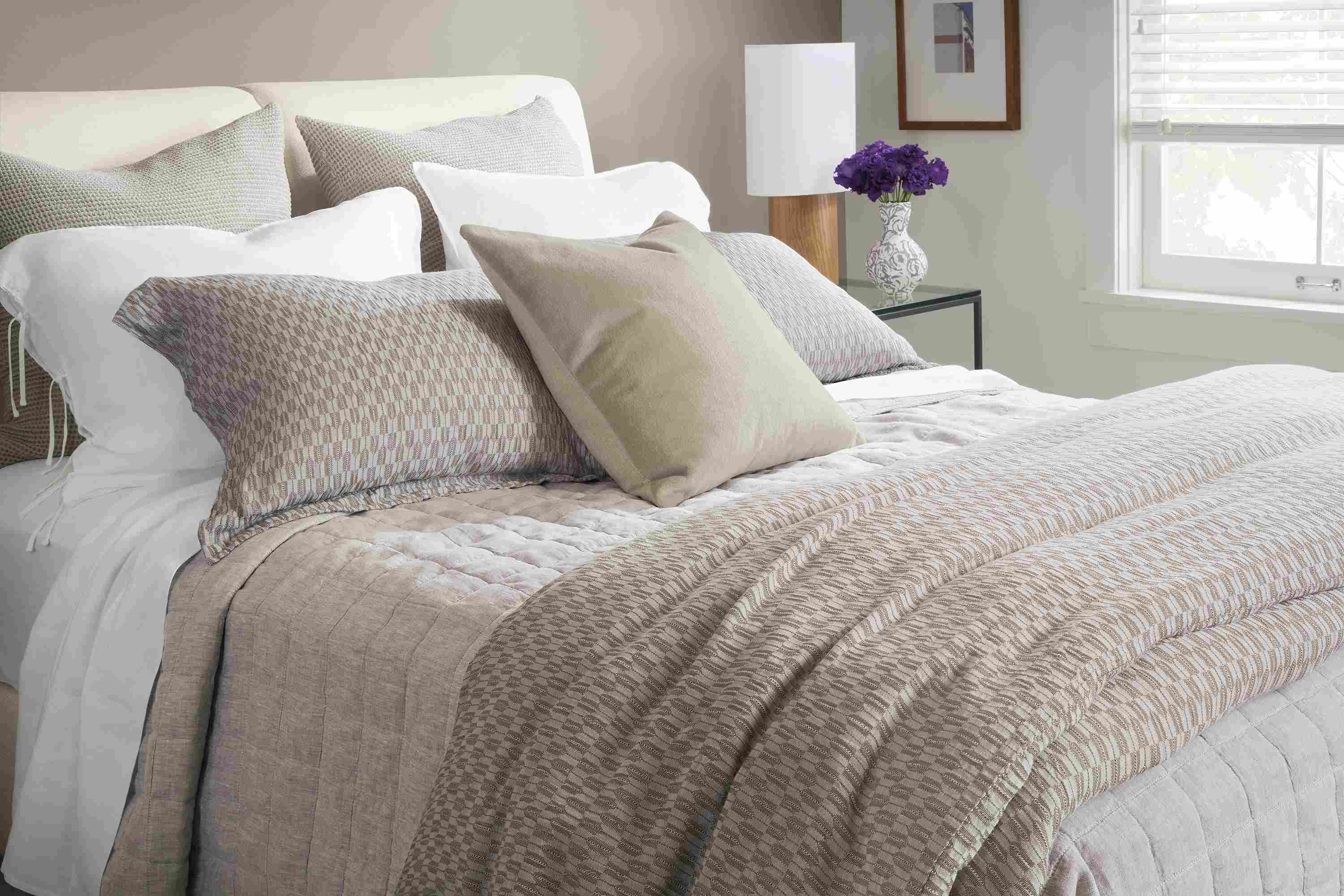 Bedroom with crofton duvet set in grey, relaxed linen coverlet in grey chambray on a nora queen bed.