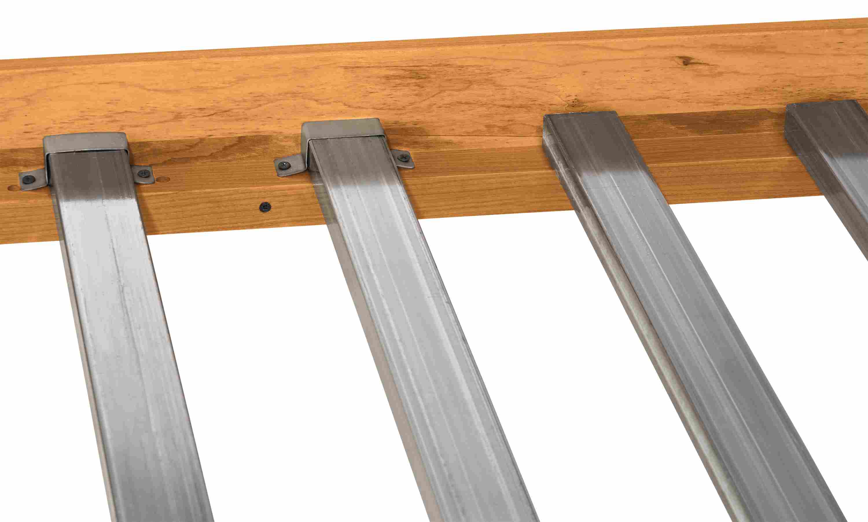 Detail of danbury queen size low footboard bed showing metal support slats.
