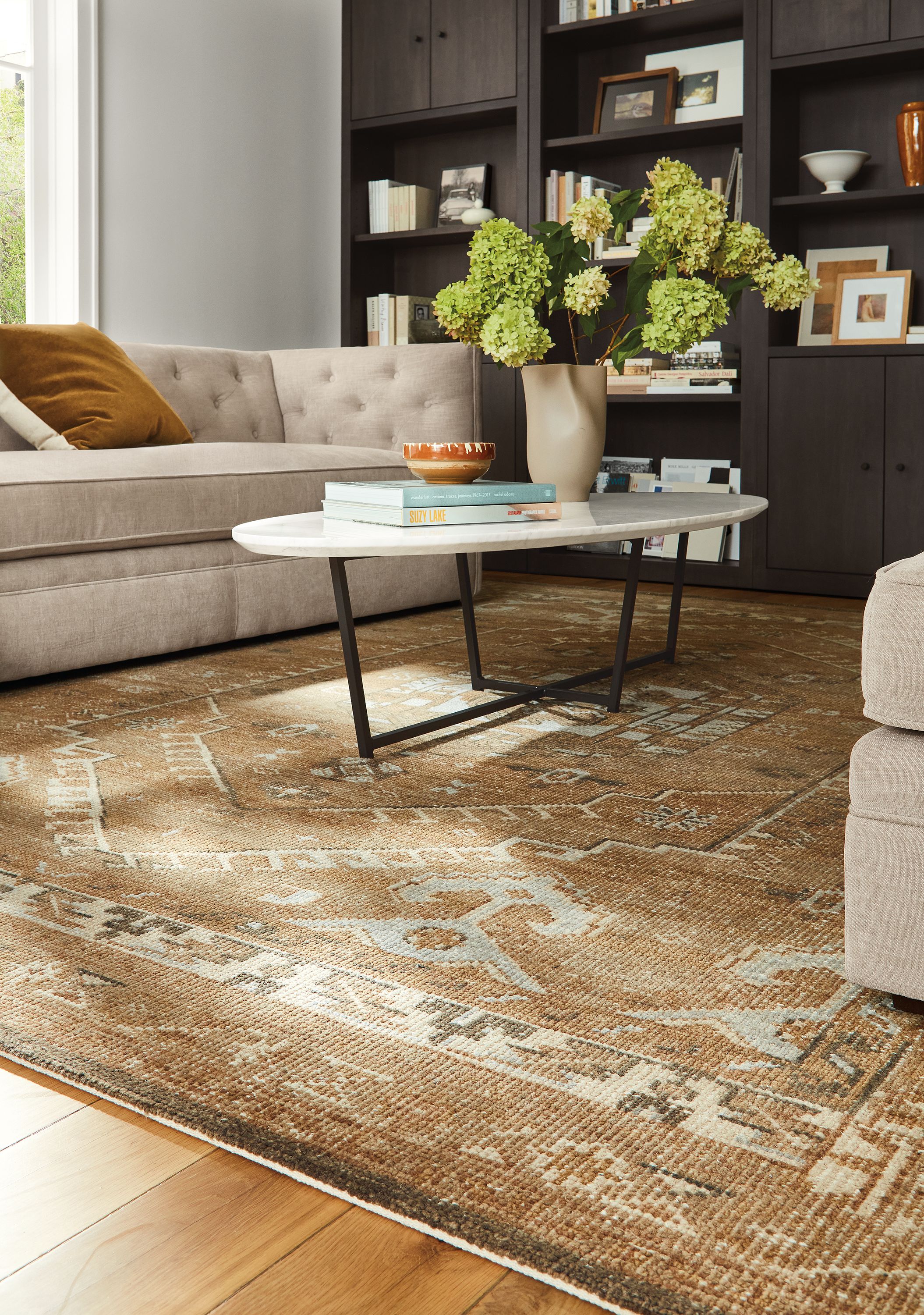 living room with darrah rug, soto coffee table, macalester sofa.