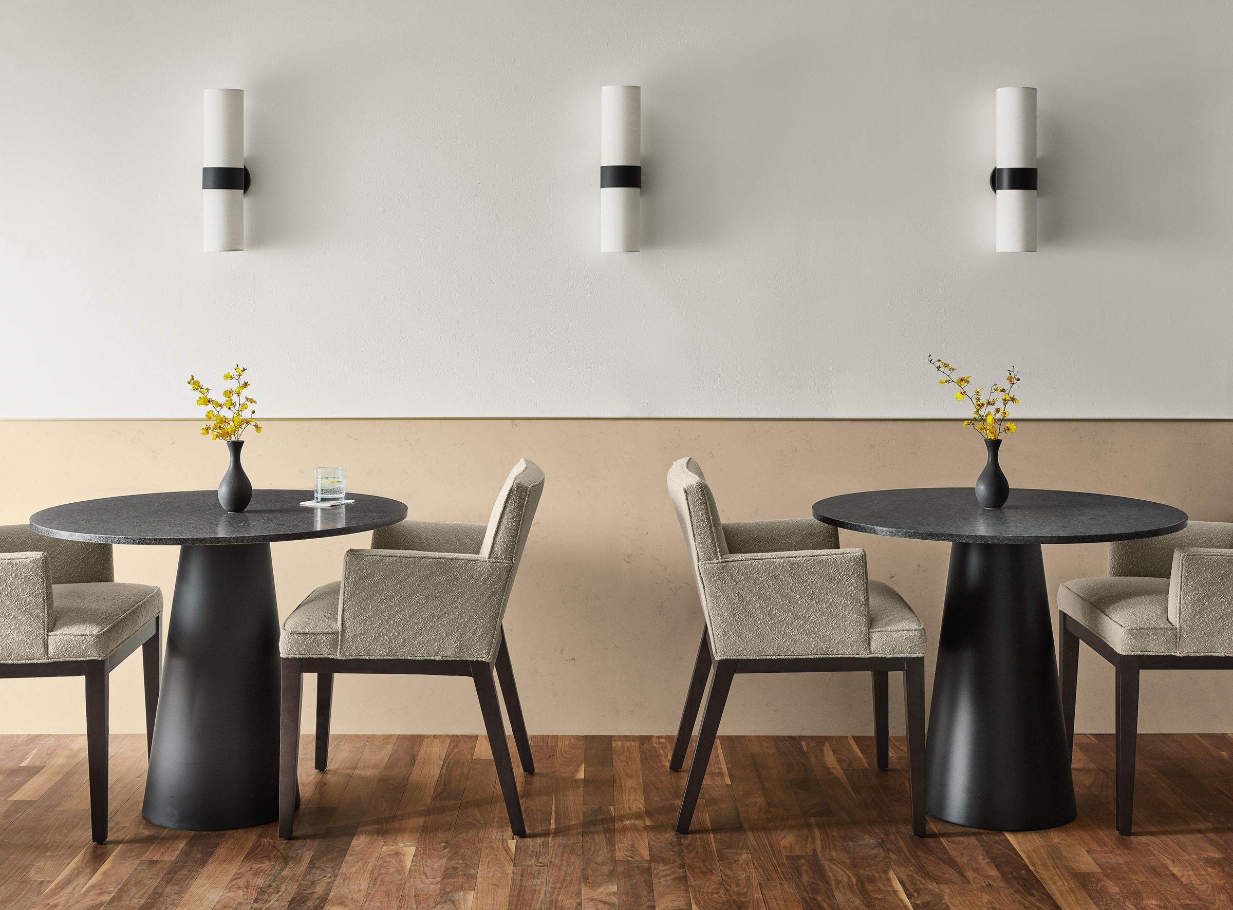 Decker Round Tables with Ansel Chairs