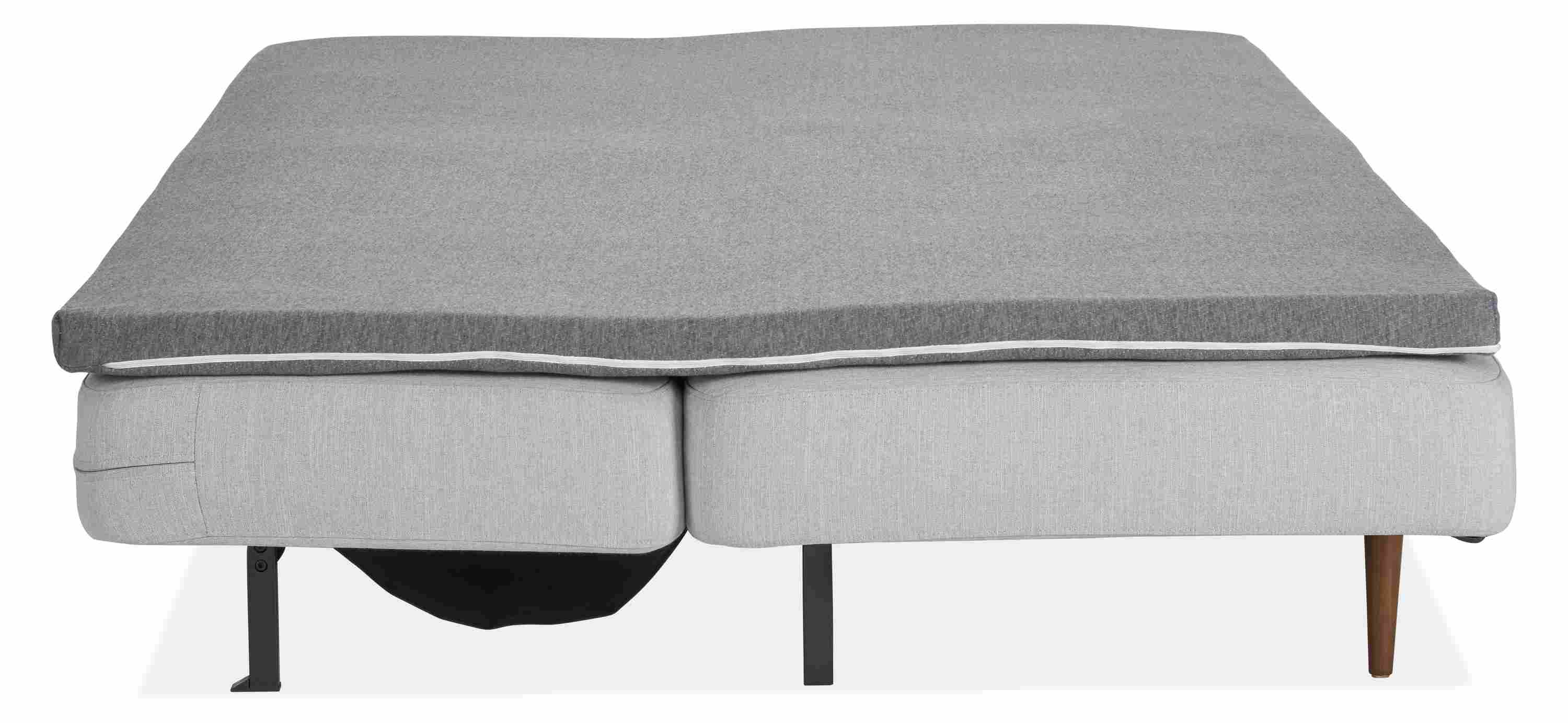 Deco armless sleeper sofa in loft.