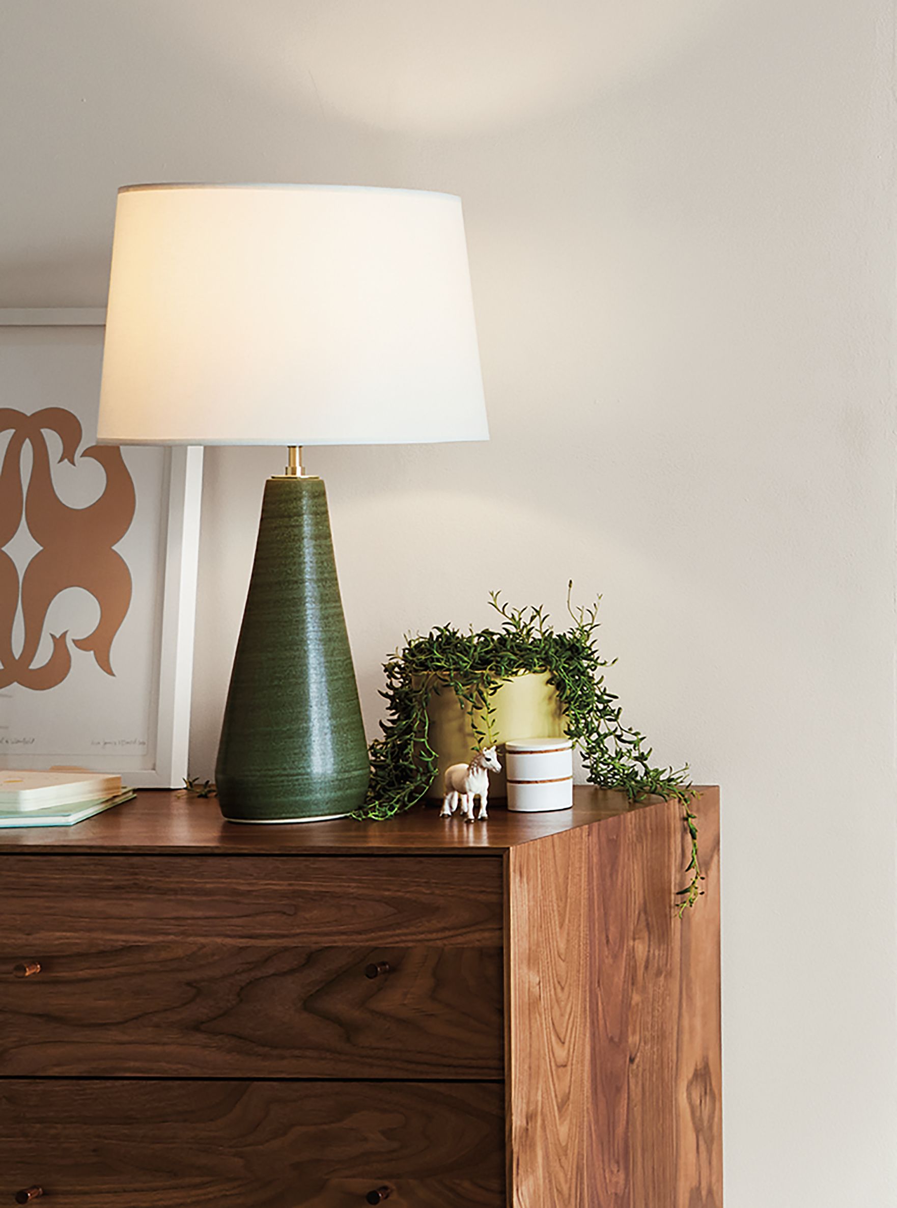 Room setting with a Nest crib and two Orikata wall sconces.