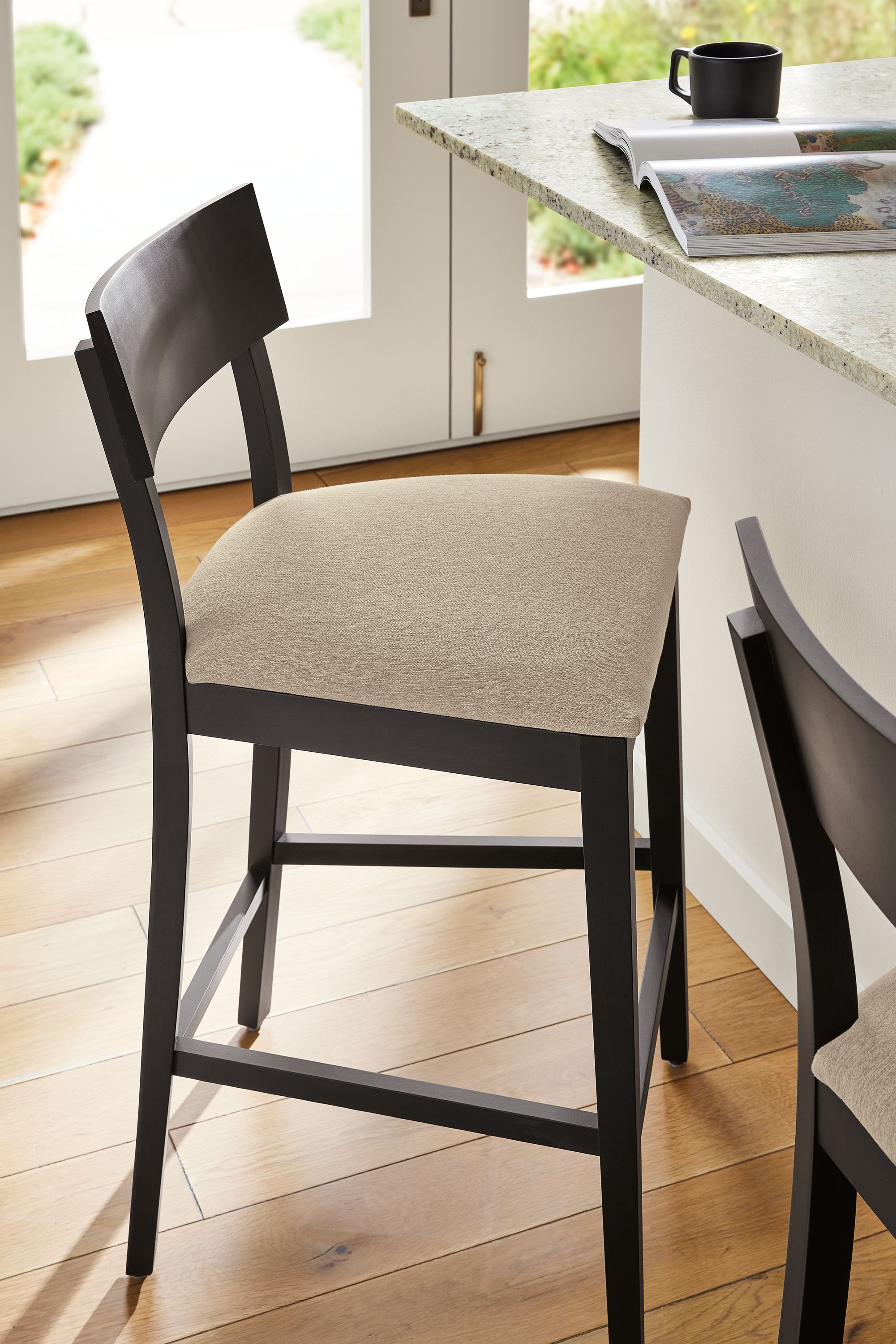 Counter stool in Myers taupe fabric and charcoal frame