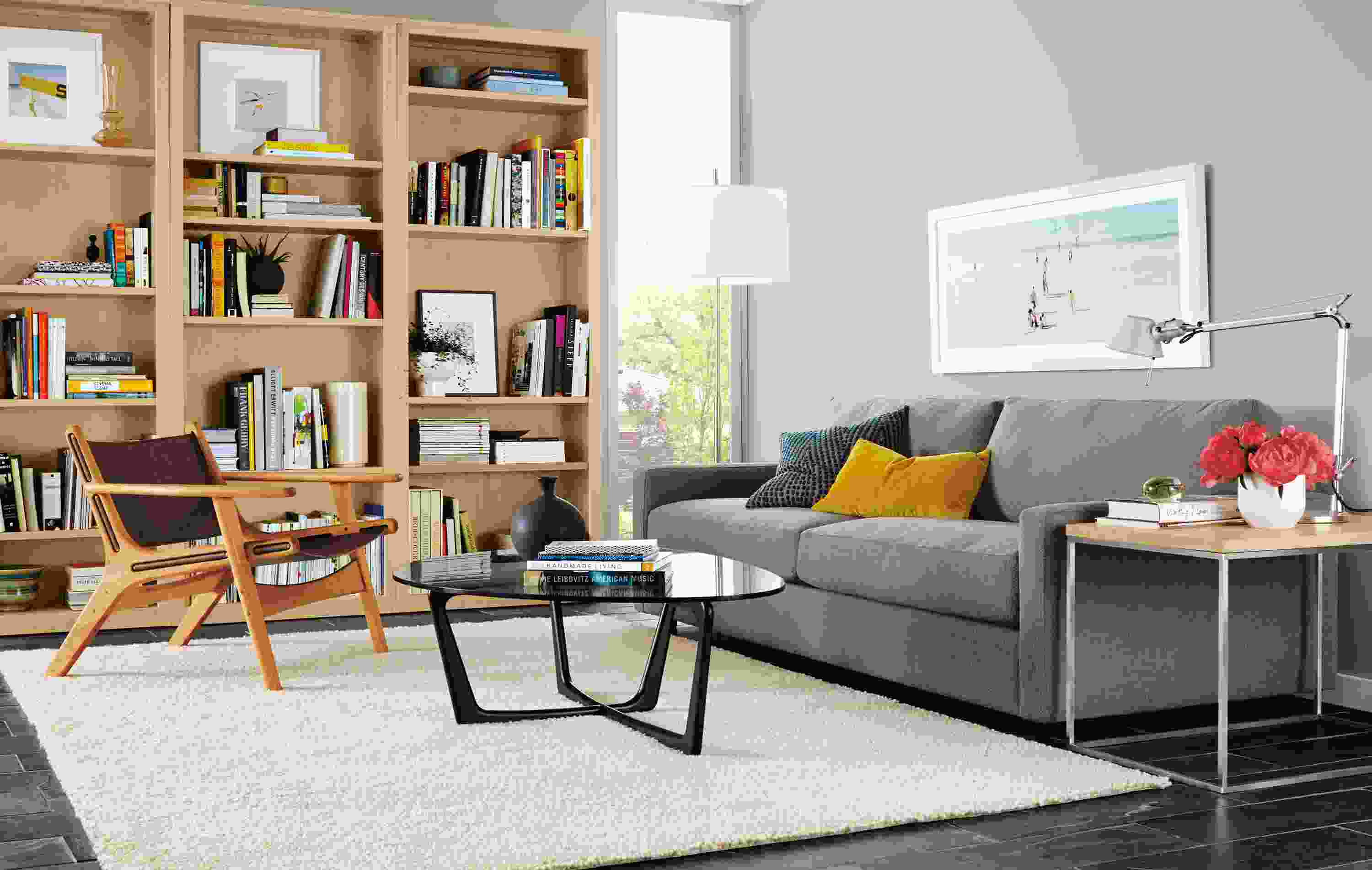 Detail of Linger sofa in grey fabric.