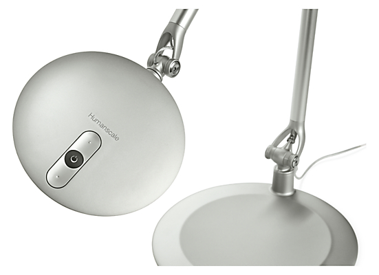 Detail of Element Disc LED 18-high Table Lamp in silver.