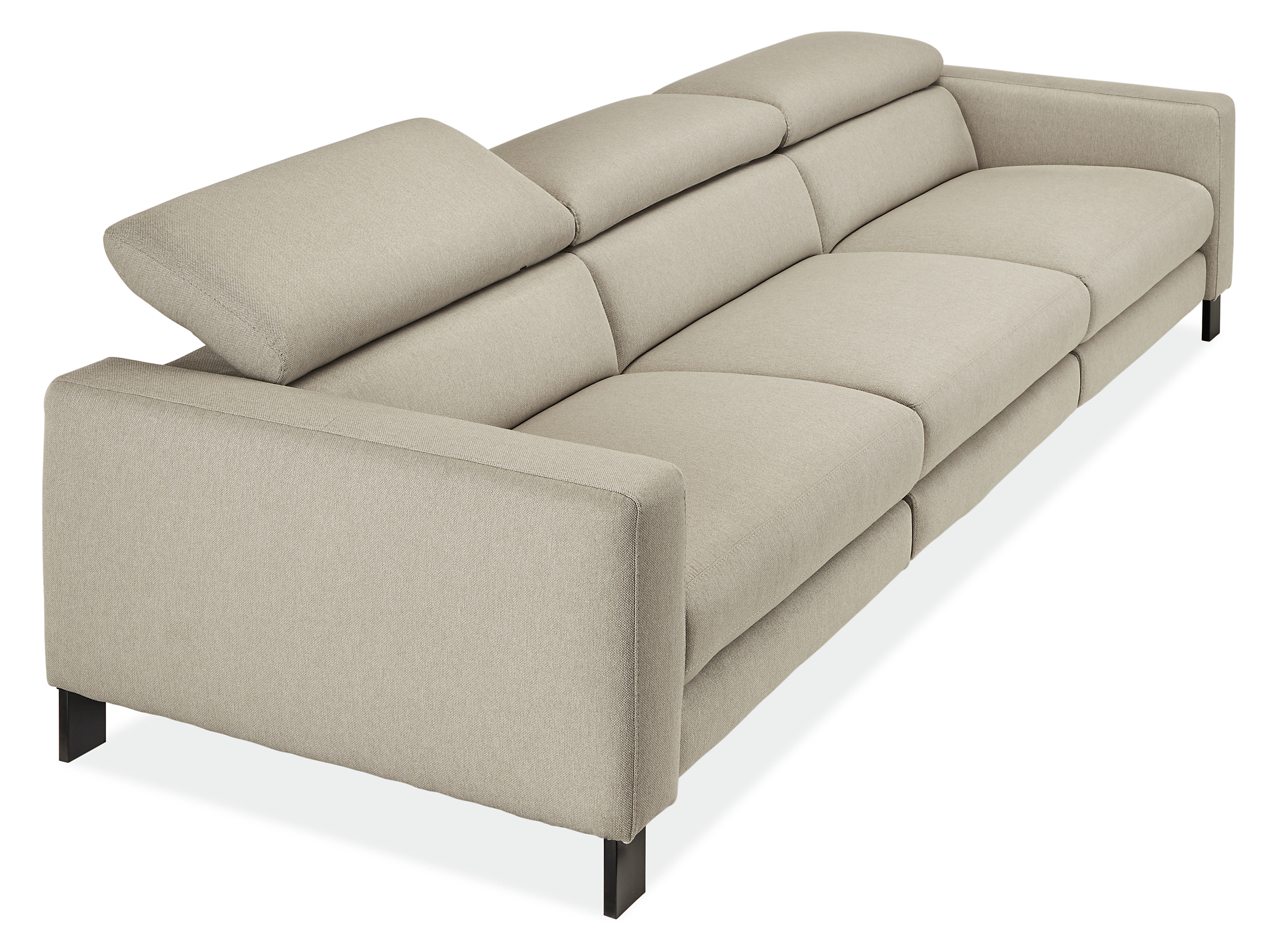 detail of gray Elio sofa with 1 headrest partially extended.