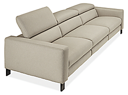 detail of gray Elio sofa with 1 headrest extended nearly fully.