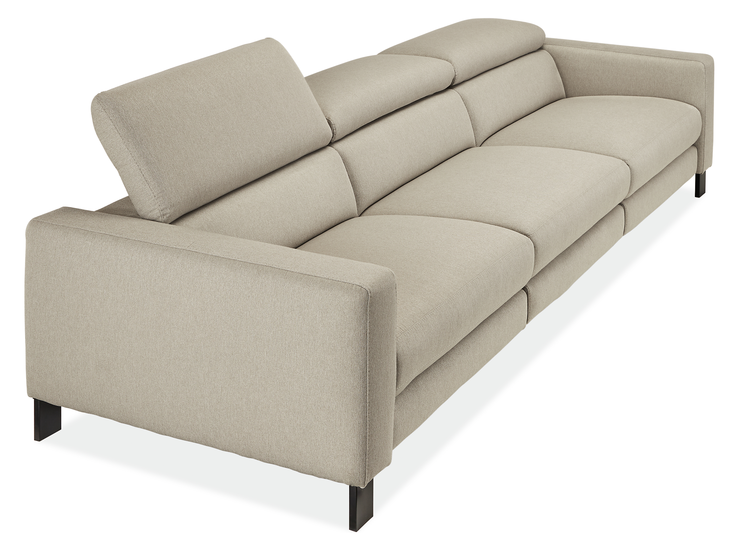 detail of gray Elio sofa with 1 headrest extended nearly fully.