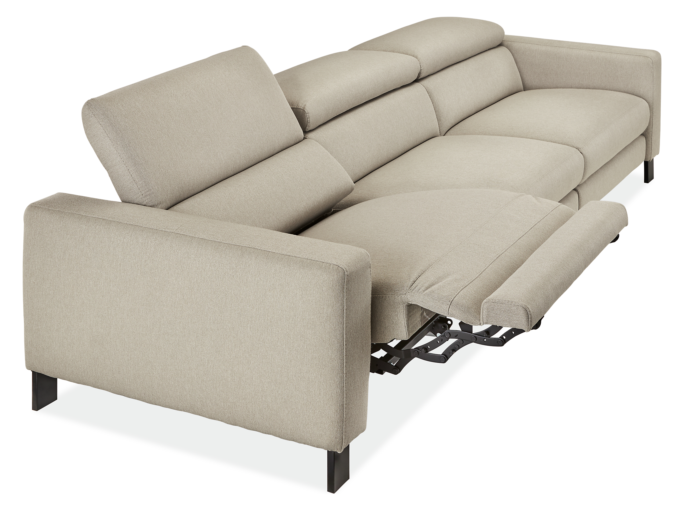detail of gray Elio sofa with 1 headrest and 1 footrest extended, partially leaned back.