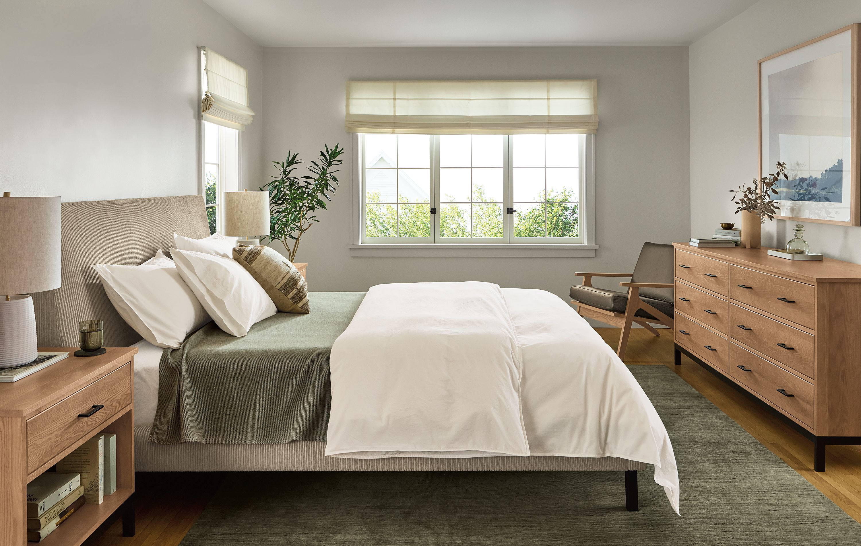 Queen bed in Brava camel fabric with graphite legs