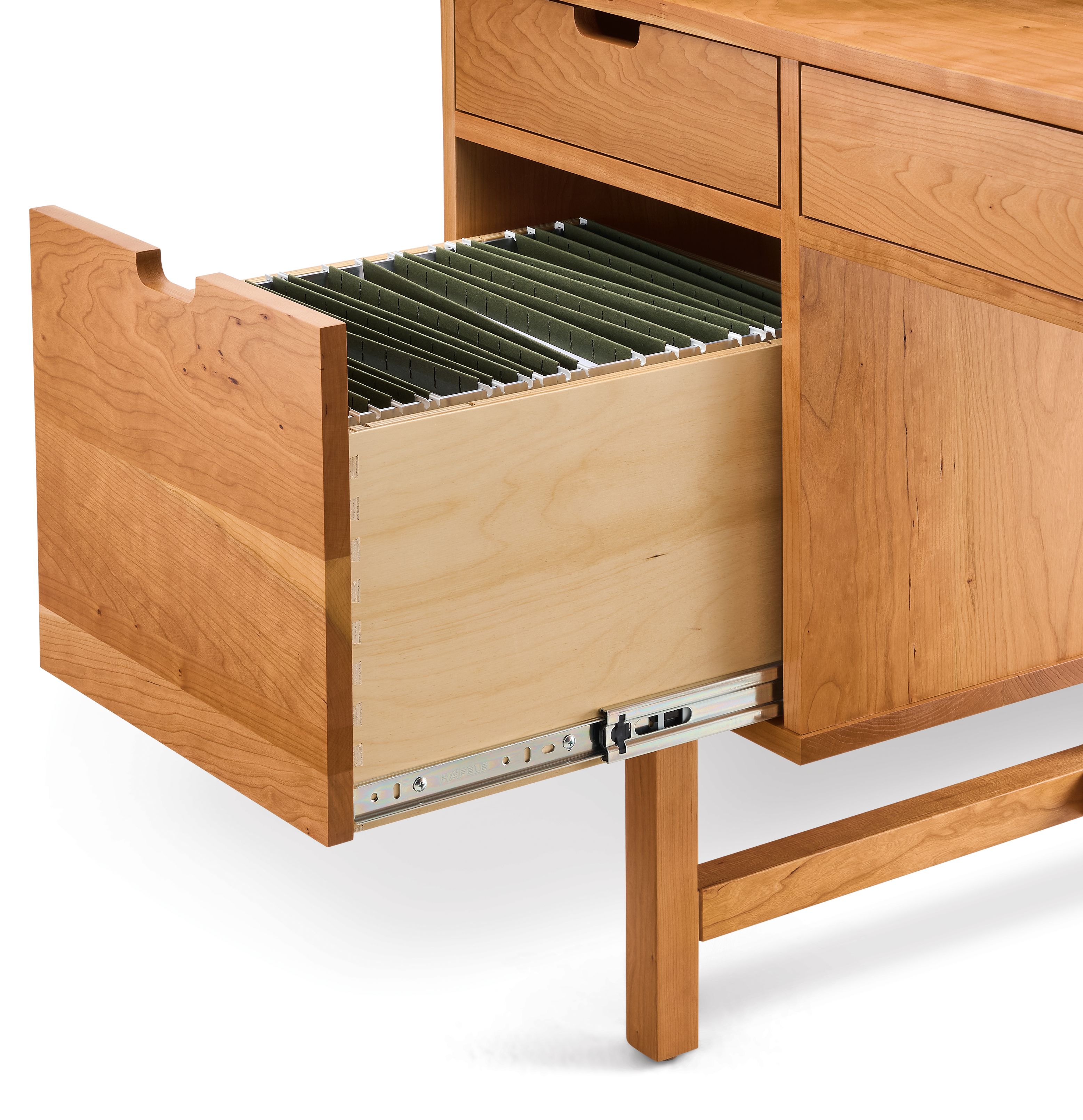 Close-up of open file drawer on an Ellis desk in cherry showing letter size file folders.