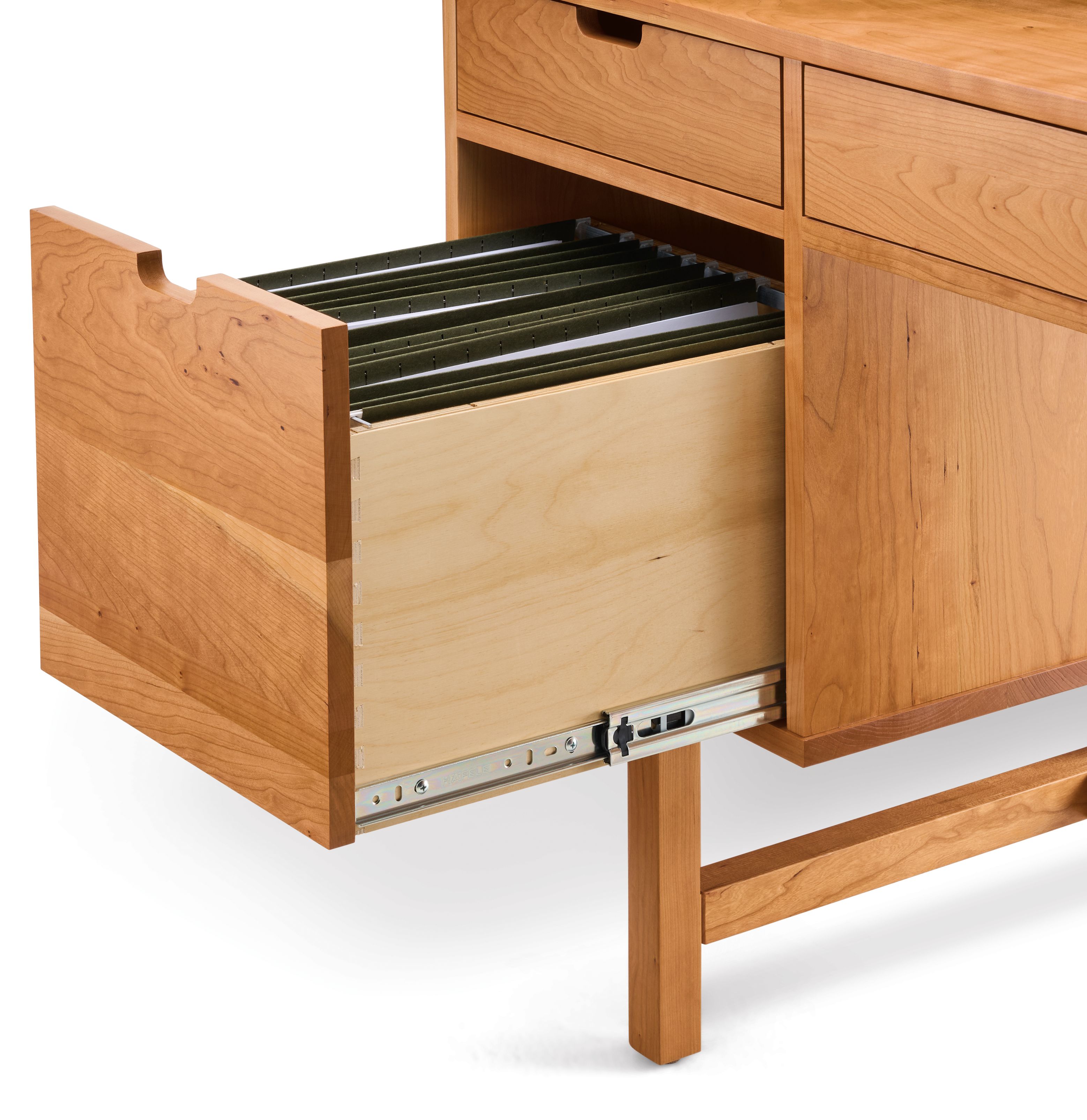 Close-up of open file drawer on an Ellis desk in cherry showing legal size file folders.