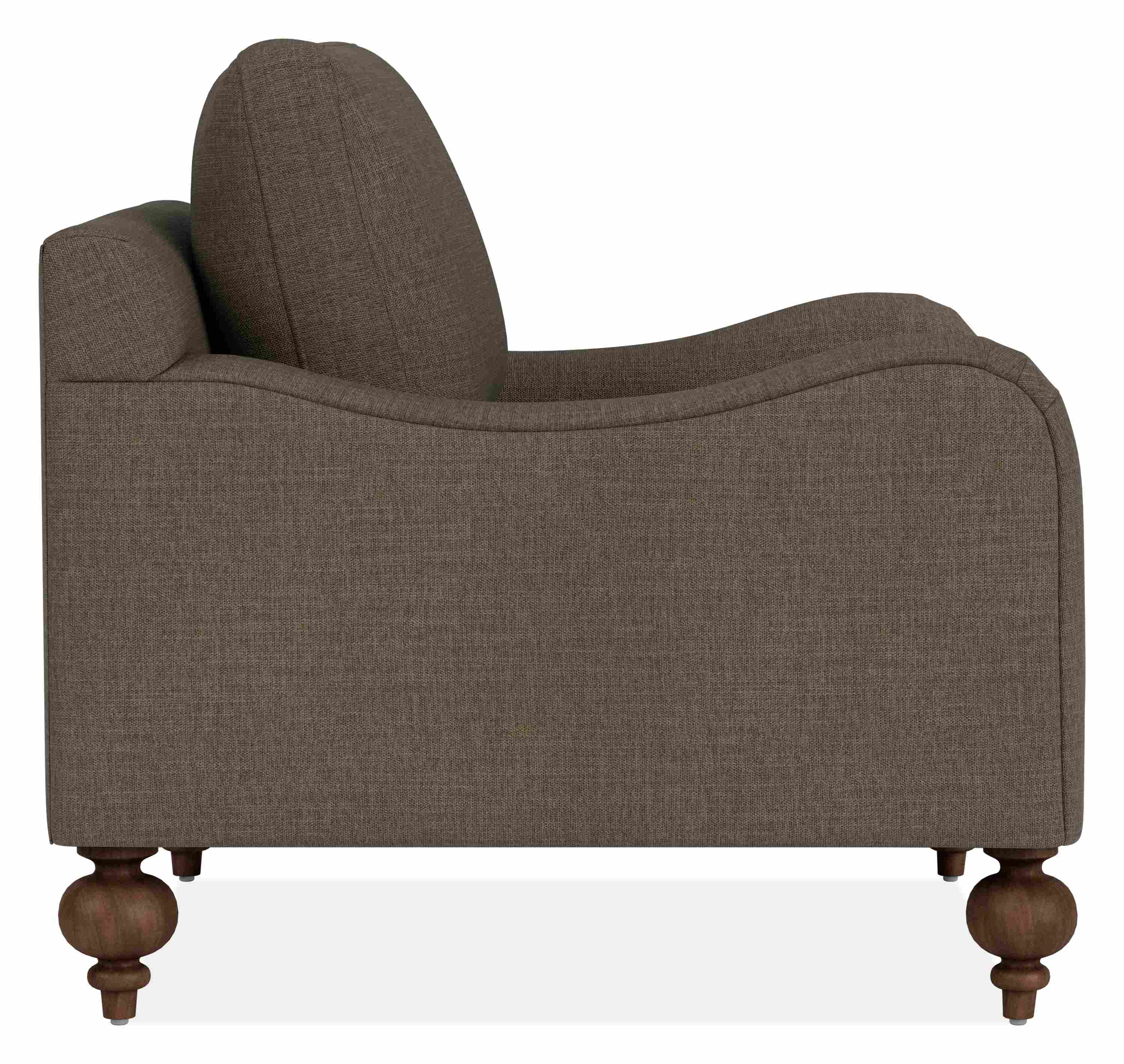 Side view of Eloise Chair in Mori Olive Fabric with Mocha-stained  turned legs.