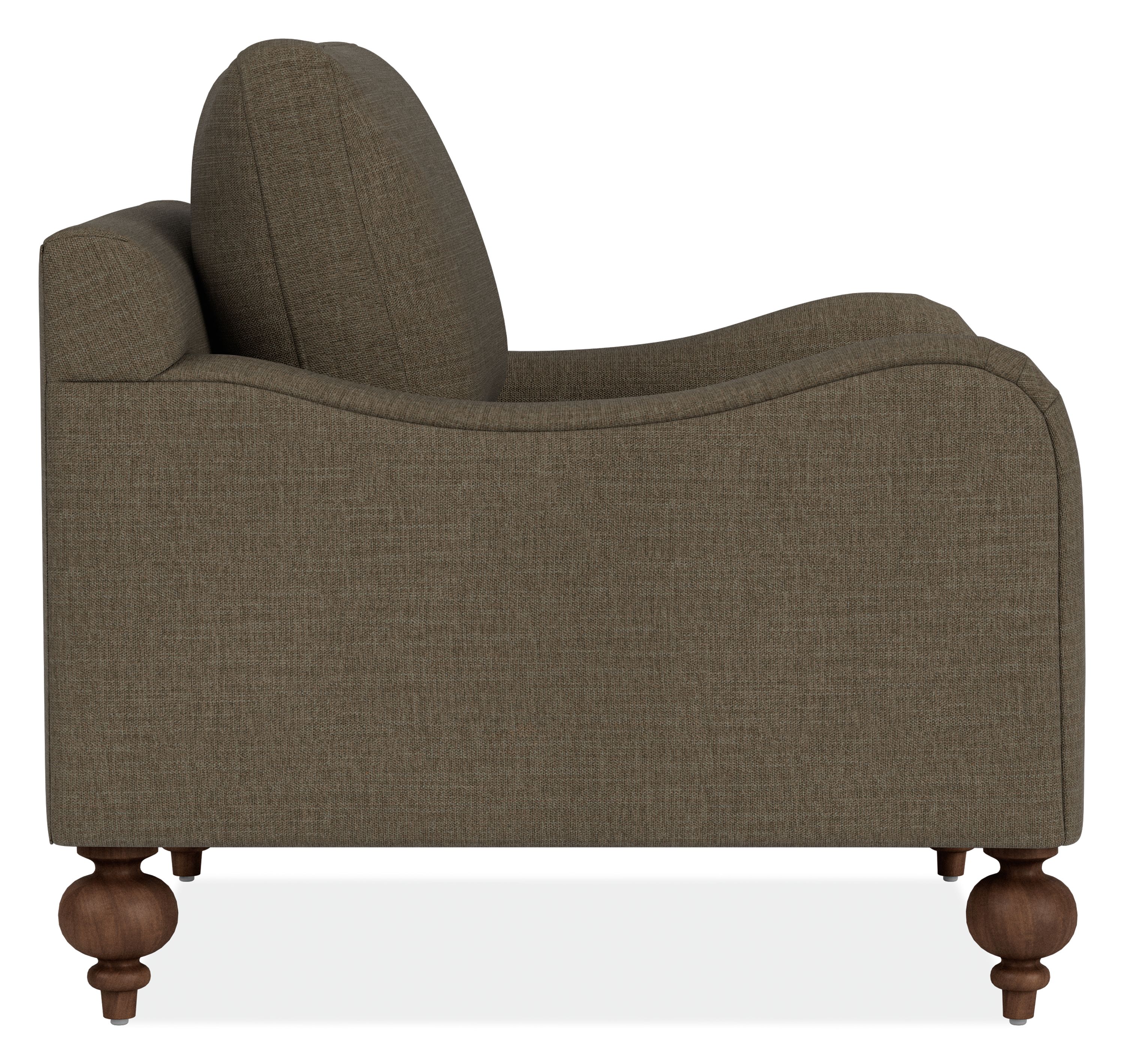 Side view of Eloise Chair in Mori Olive Fabric with Mocha-stained  turned legs.